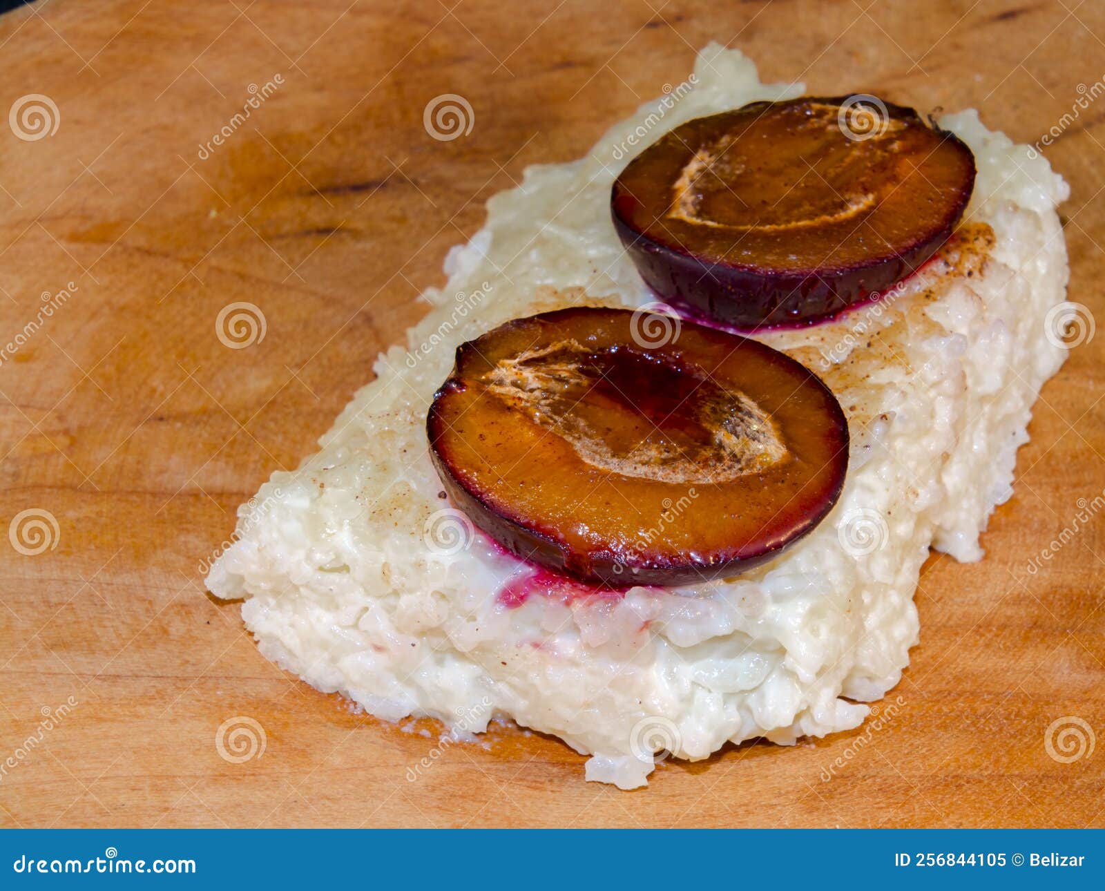 Milky Rice Pudding with Plums for Dessert Stock Image Image of baking