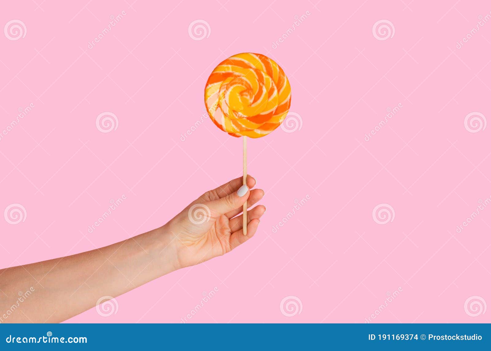 Millennial Girl Holding Yummy Swirl Lollipop Over Pink Background ...