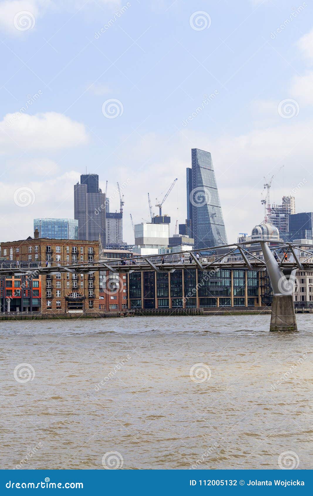 Millennium Bridge And Modern Glezed Office Buildings London