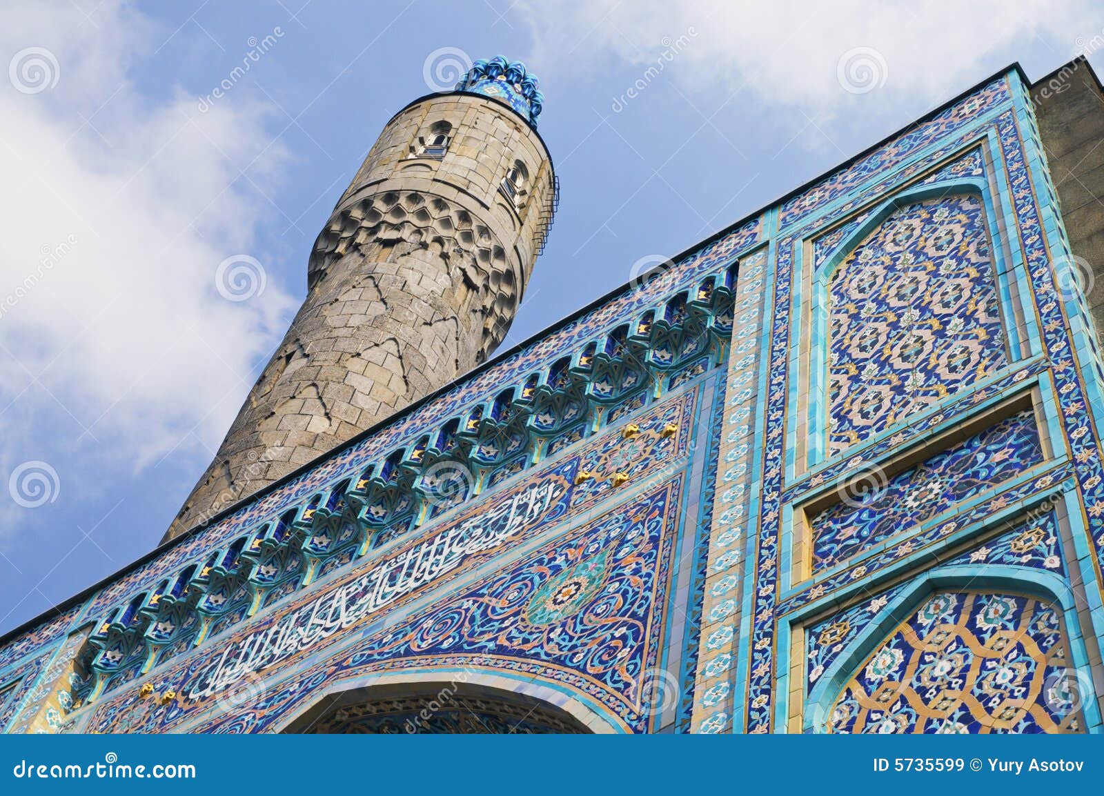 minaret and the front wall with arabic mosaics
