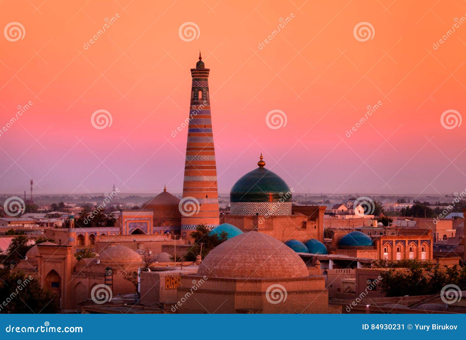 minaret and madrasah of islam-khoja in the old khiva