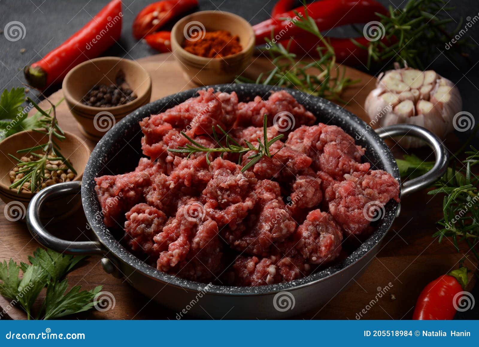 Minced Beef. Ground Meat with Ingredients for Cooking on Black