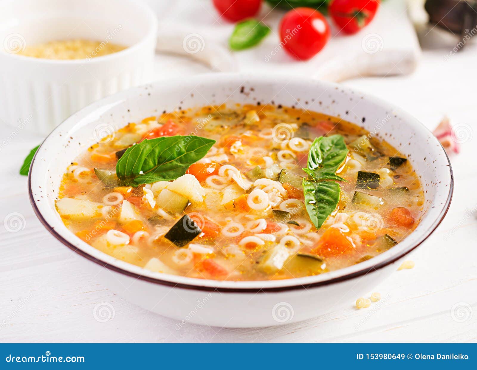 Minestrone, Italian Vegetable Soup with Pasta on White Table. Stock ...