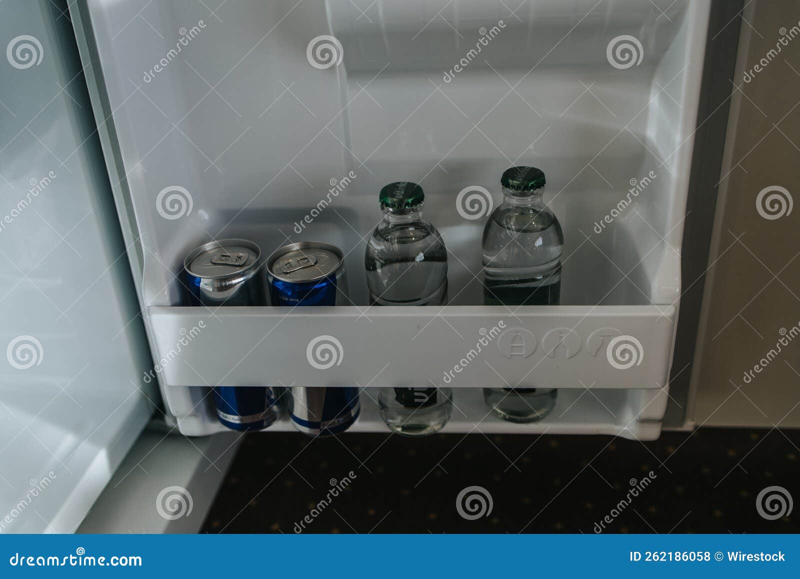 Mini bar in hotel room editorial stock photo. Image of fridge 262186058