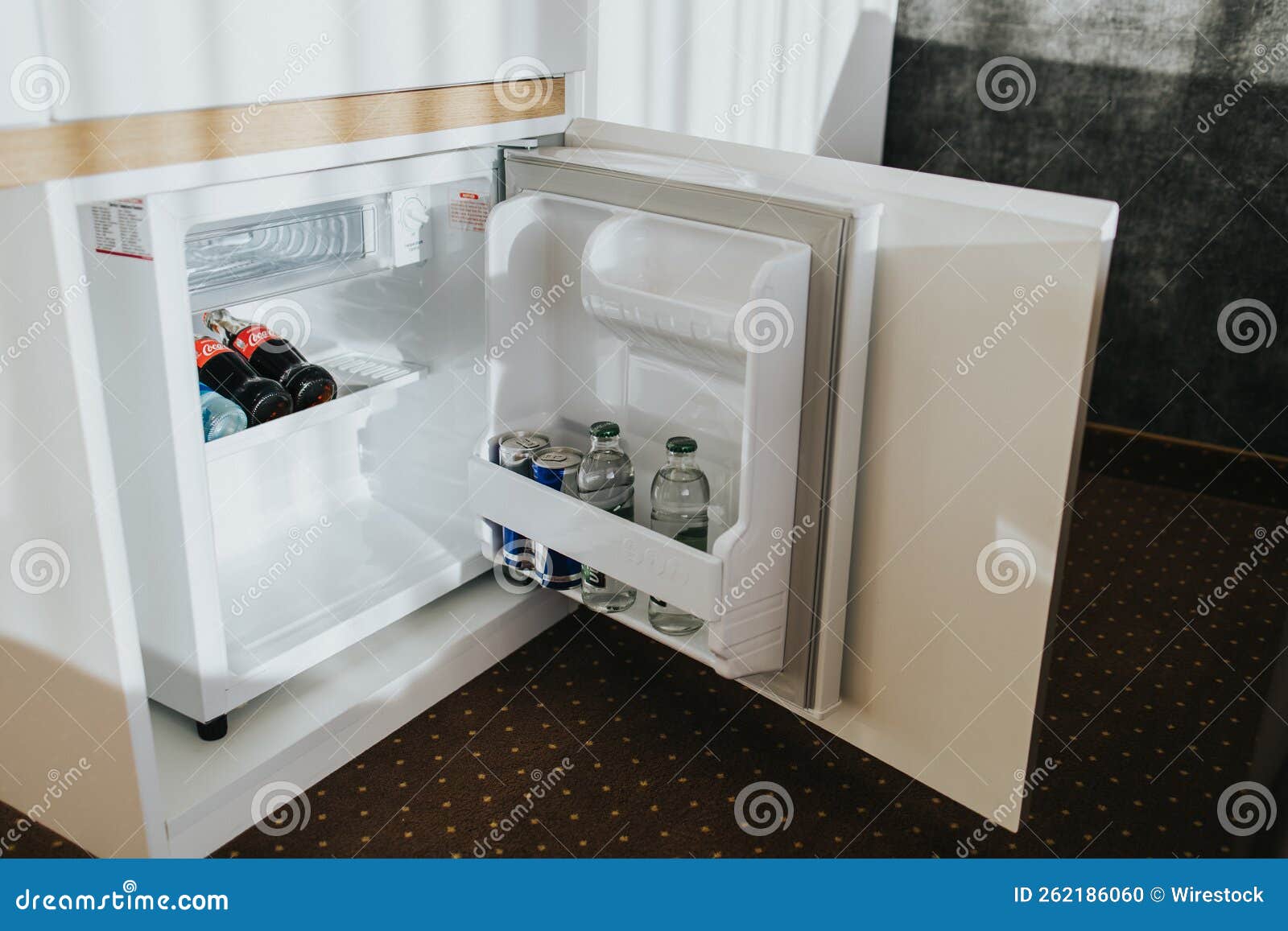 Mini bar in hotel room editorial image. Image of cold 262186060