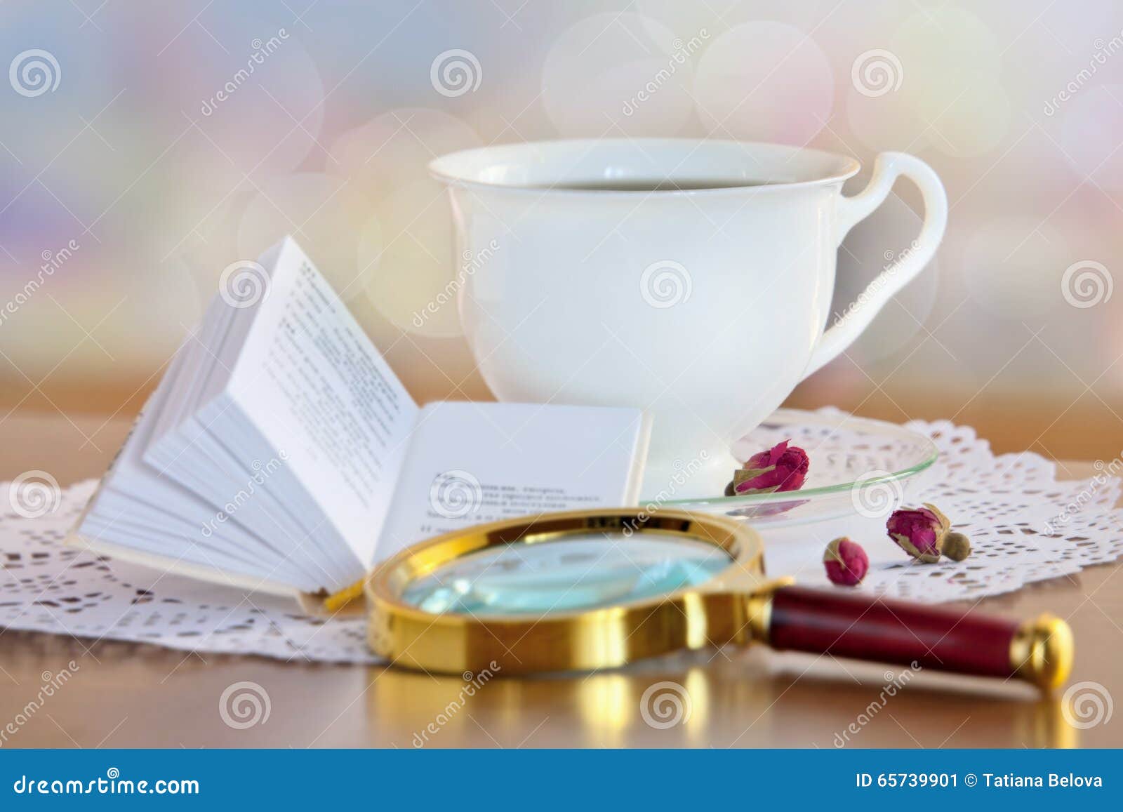 Mini Book and Magnifying Glass on Table Stock Image Image of table