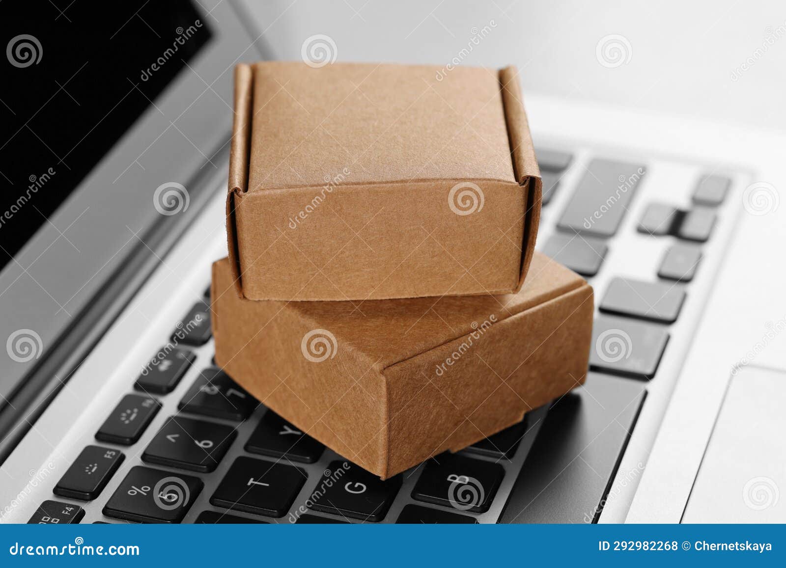 Mini Boxes on Laptop, Closeup. Online Store Stock Photo Image of