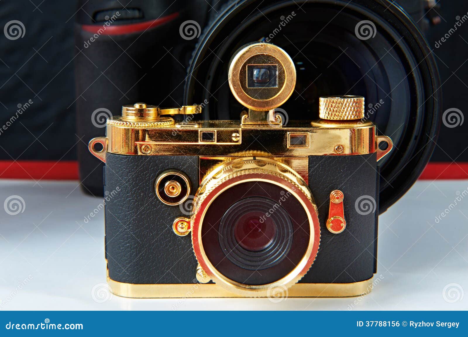 Mini gift golden camera stock photo. Image of contemporary 37788156