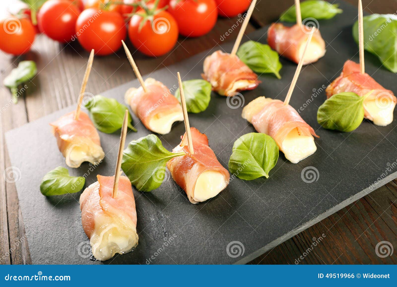 Mini Mozzarella Wrapped in Prosciutto Ham and Baked Stock Photo Image