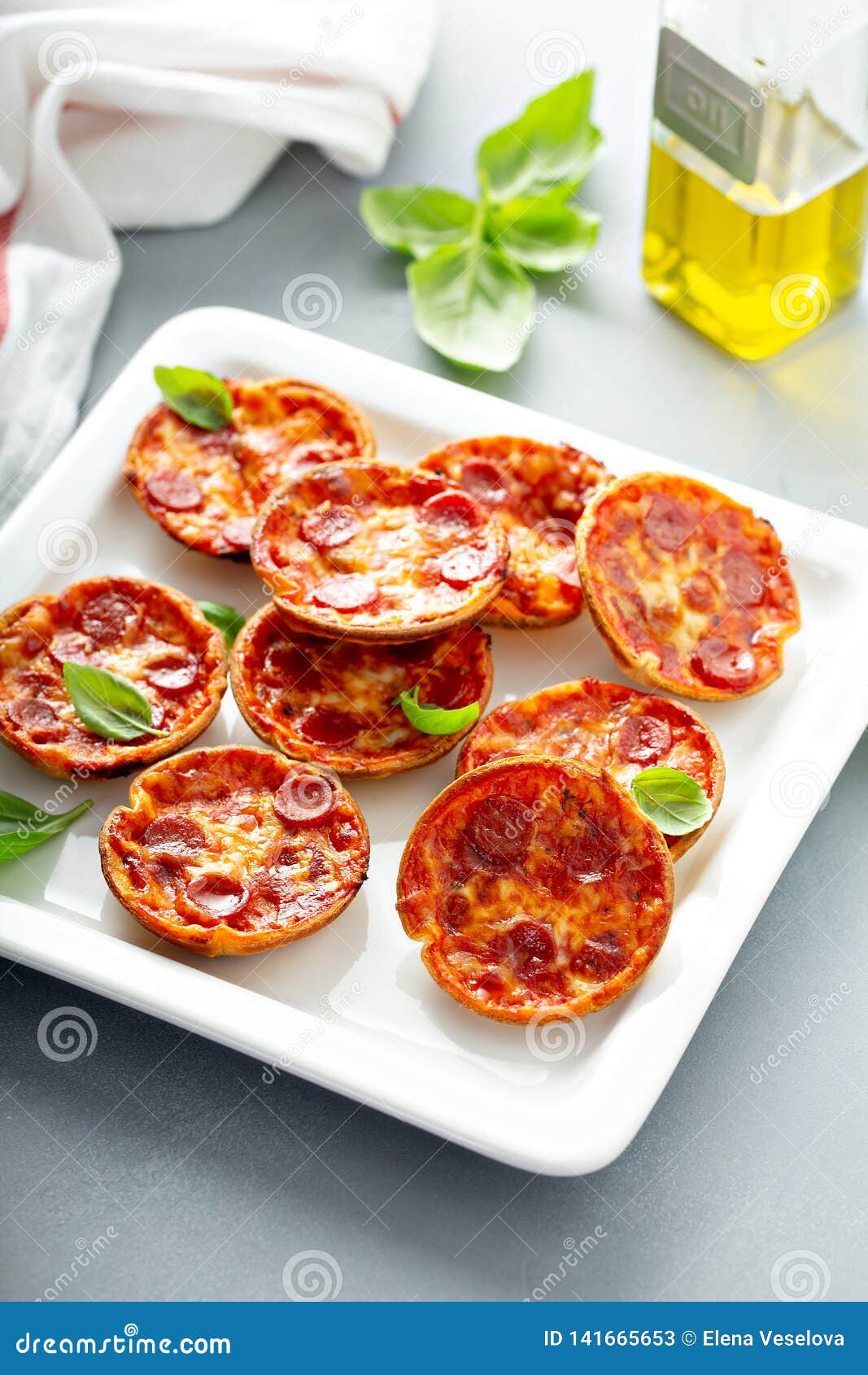 Mini pepperoni pizzas stock image. Image of mini, cheese 141665653
