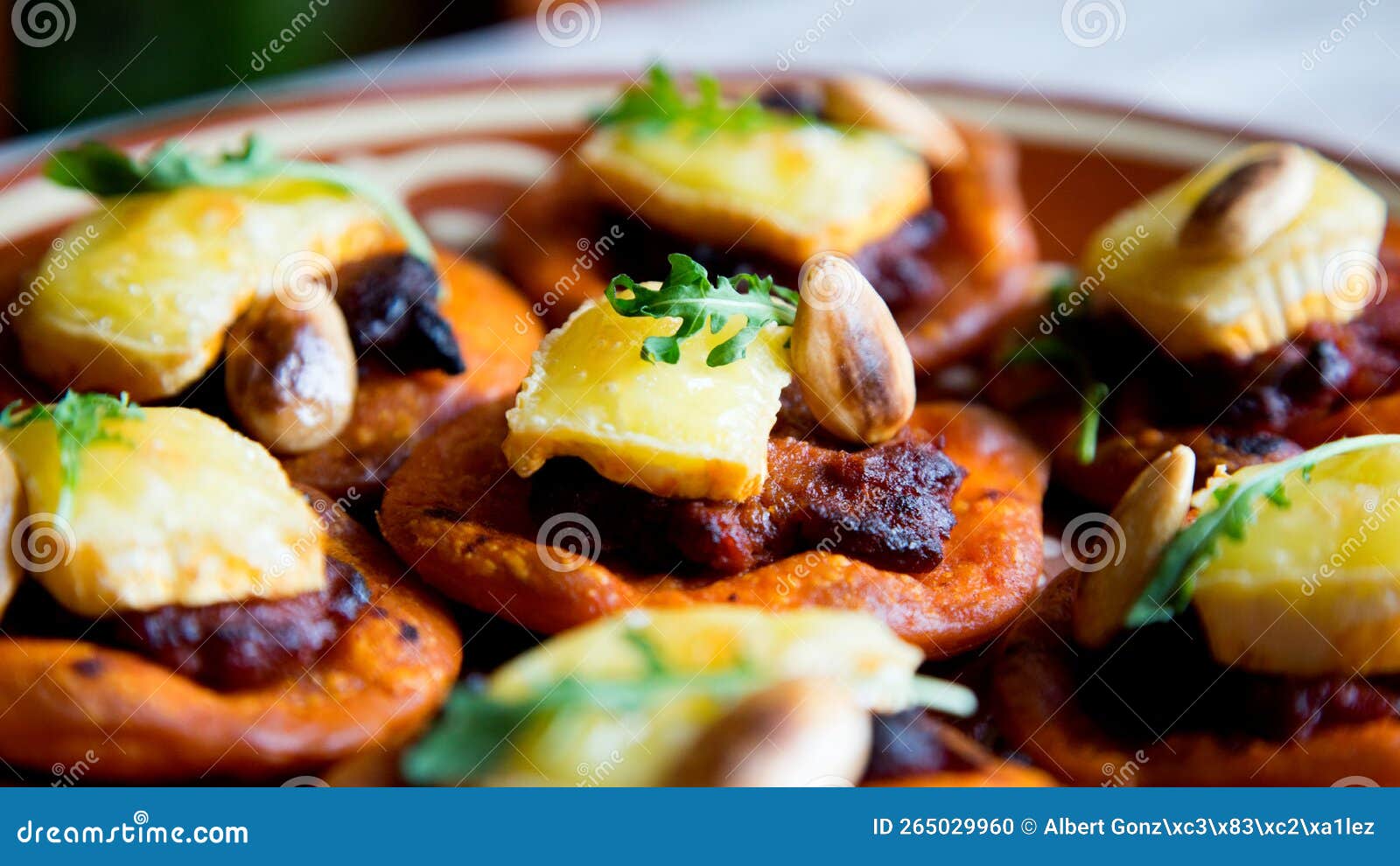 Mini Pizza with Sobrassada and Brie Cheese. Stock Photo Image of