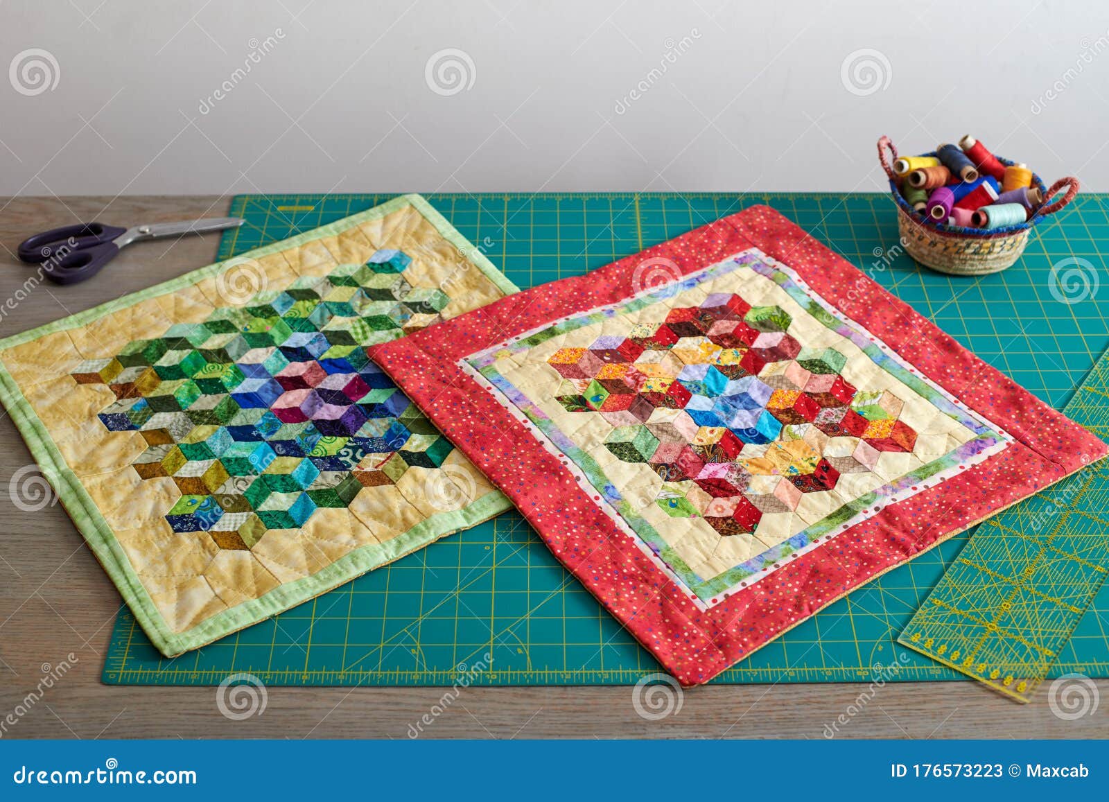 Mini Quilts, Basket with Spools of Thread, Tools for Patchwork and Sewing on Cutting Mat Stock