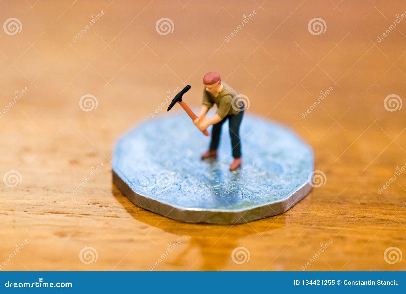 Miniature Figure As Miner Digging Coin Stock Image - Image ...