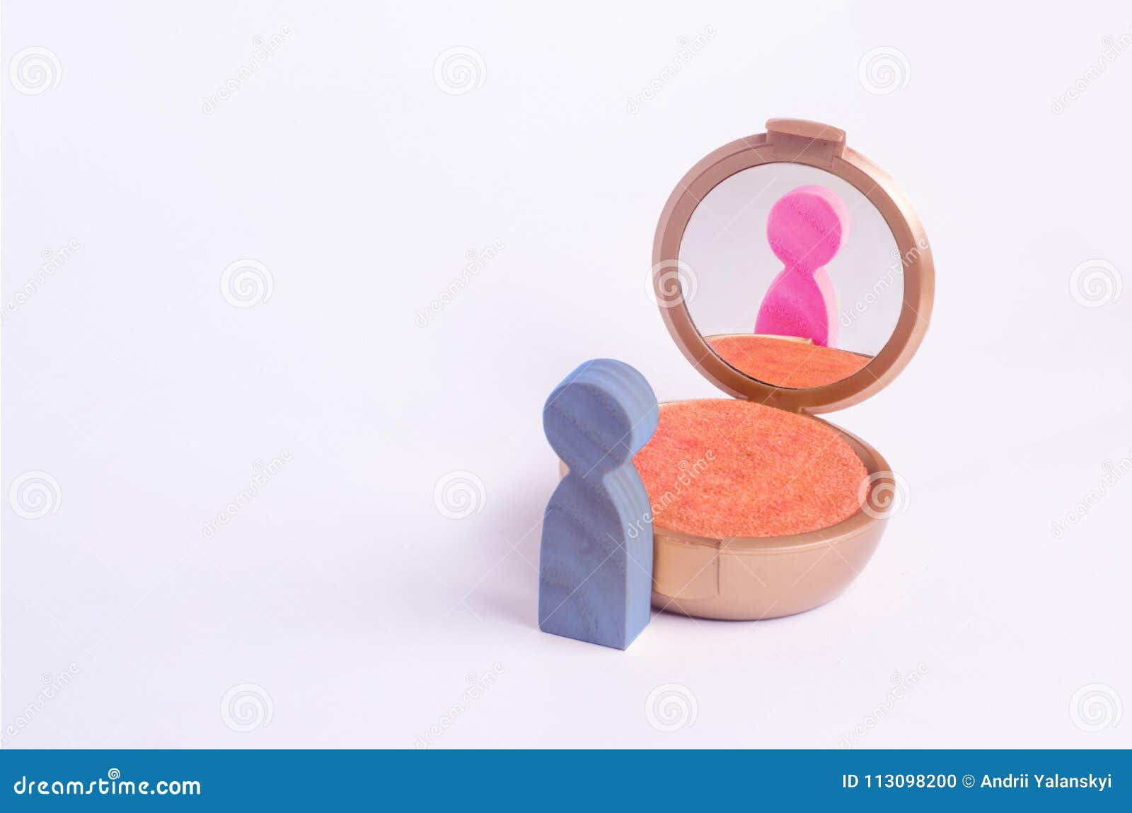 a miniature figure of a man looks in the mirror and sees his hatching in another gender. the concept of gender identity.