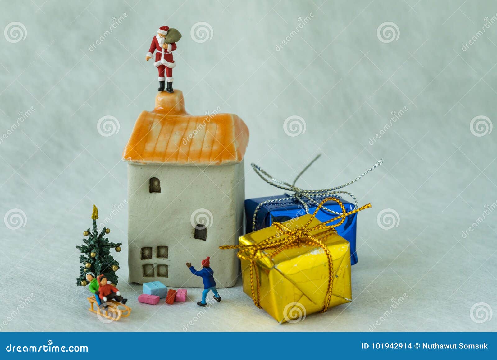 Miniature Figure Santa Claus Standing on Roof Chimney and Children ...