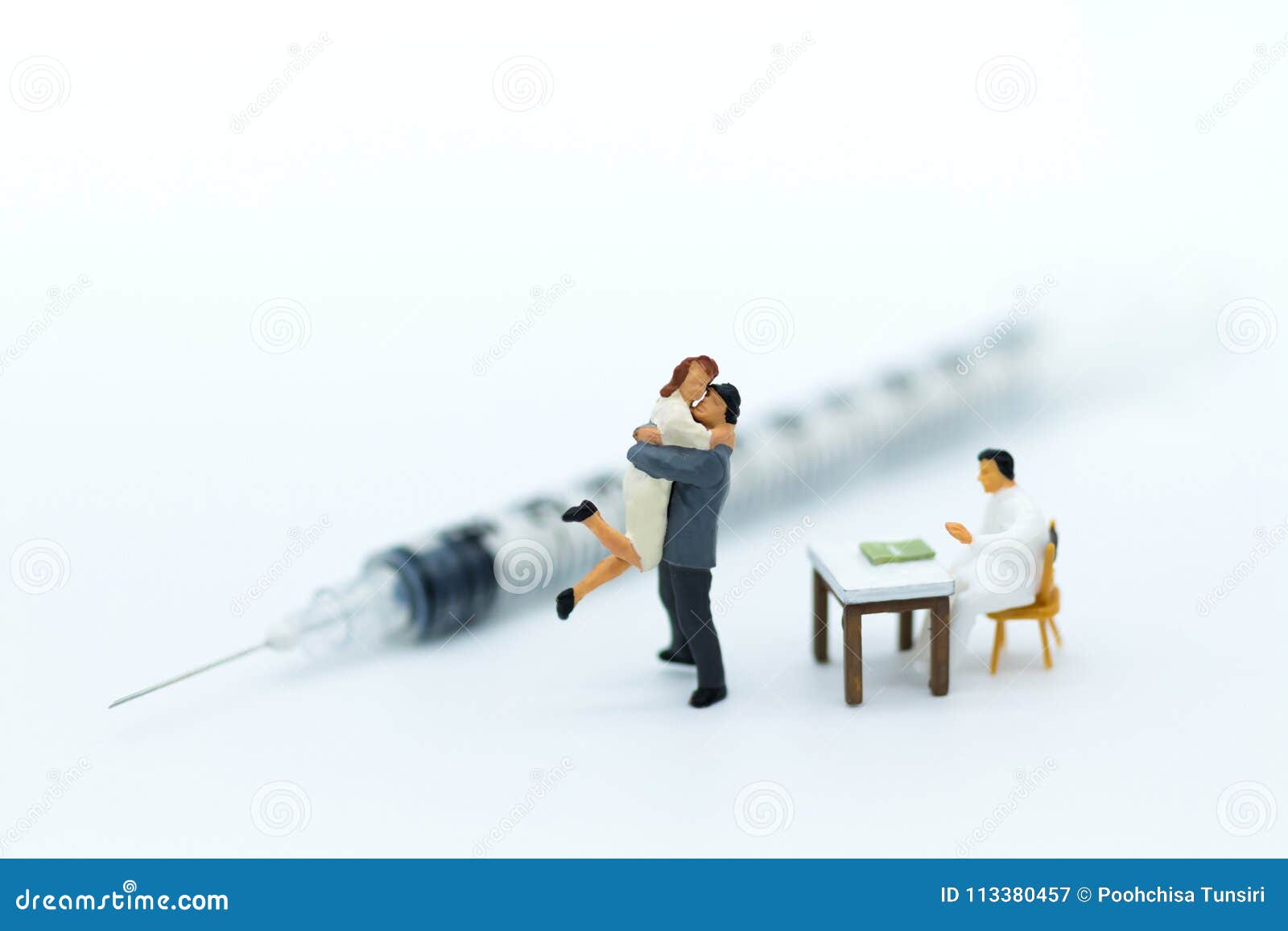 miniature people: couples with physical examination before marriage. image use for family readiness, health care concept