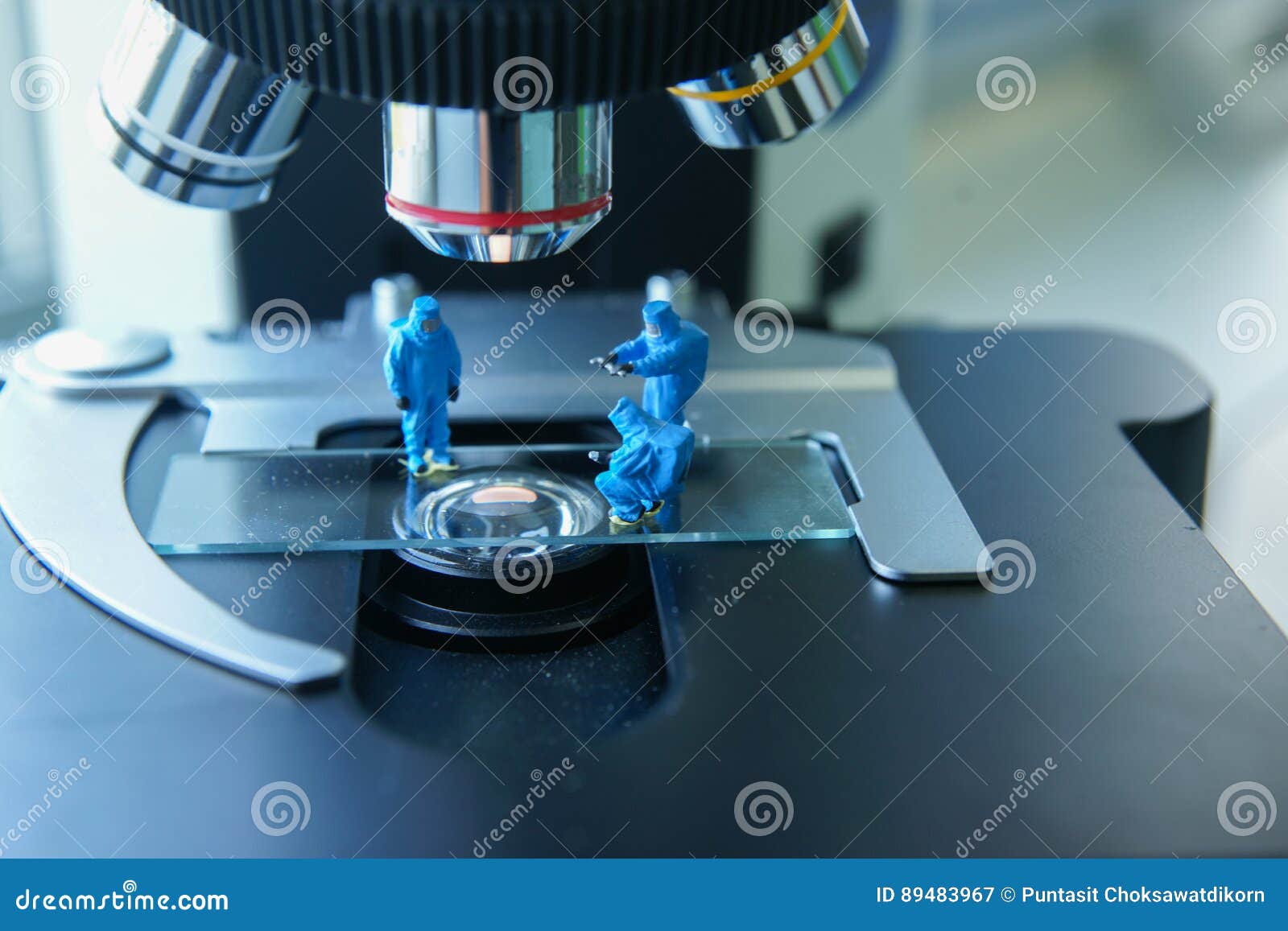miniature people scientist at work