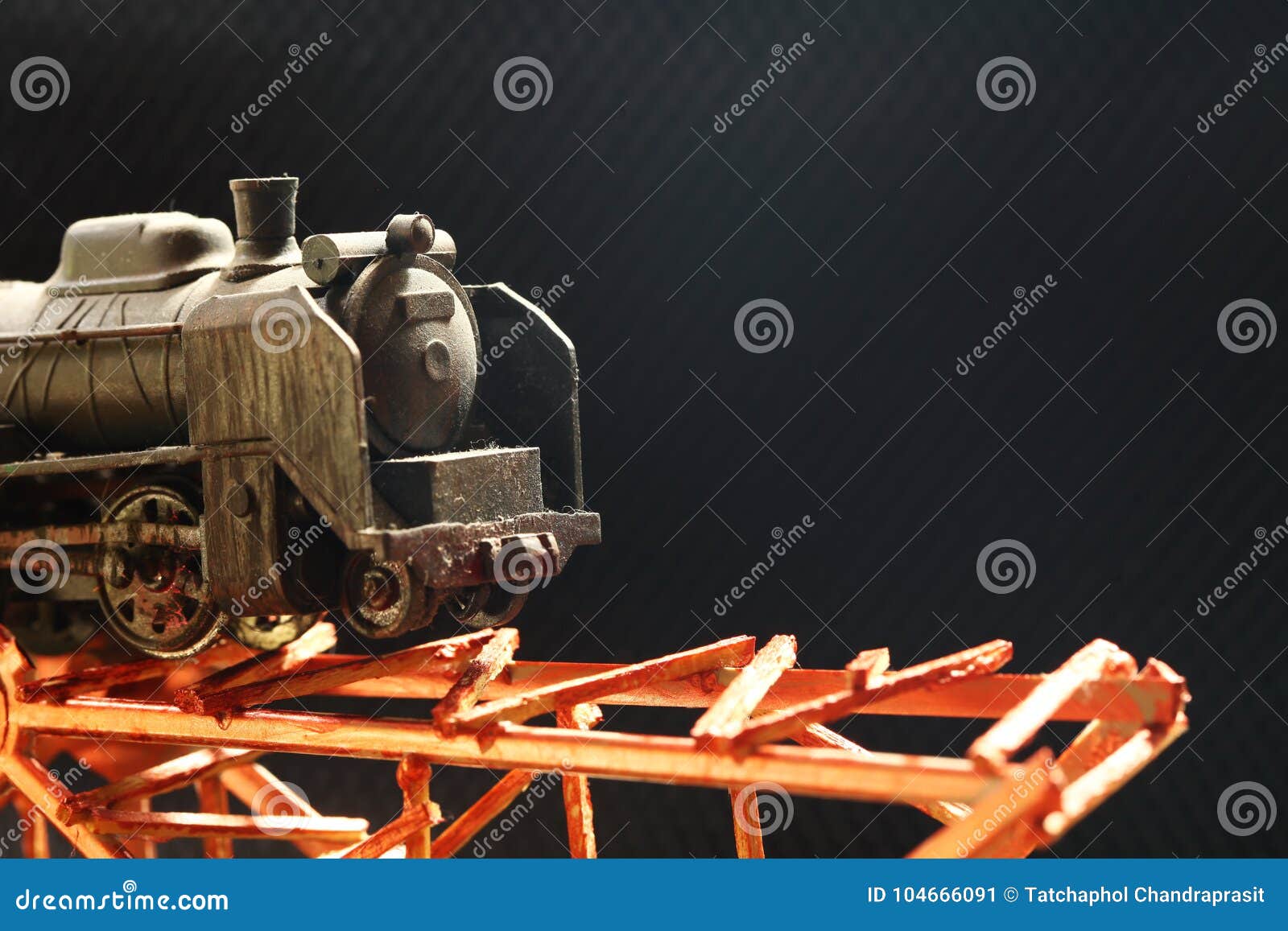 the miniature plastic model railroad on bridge.