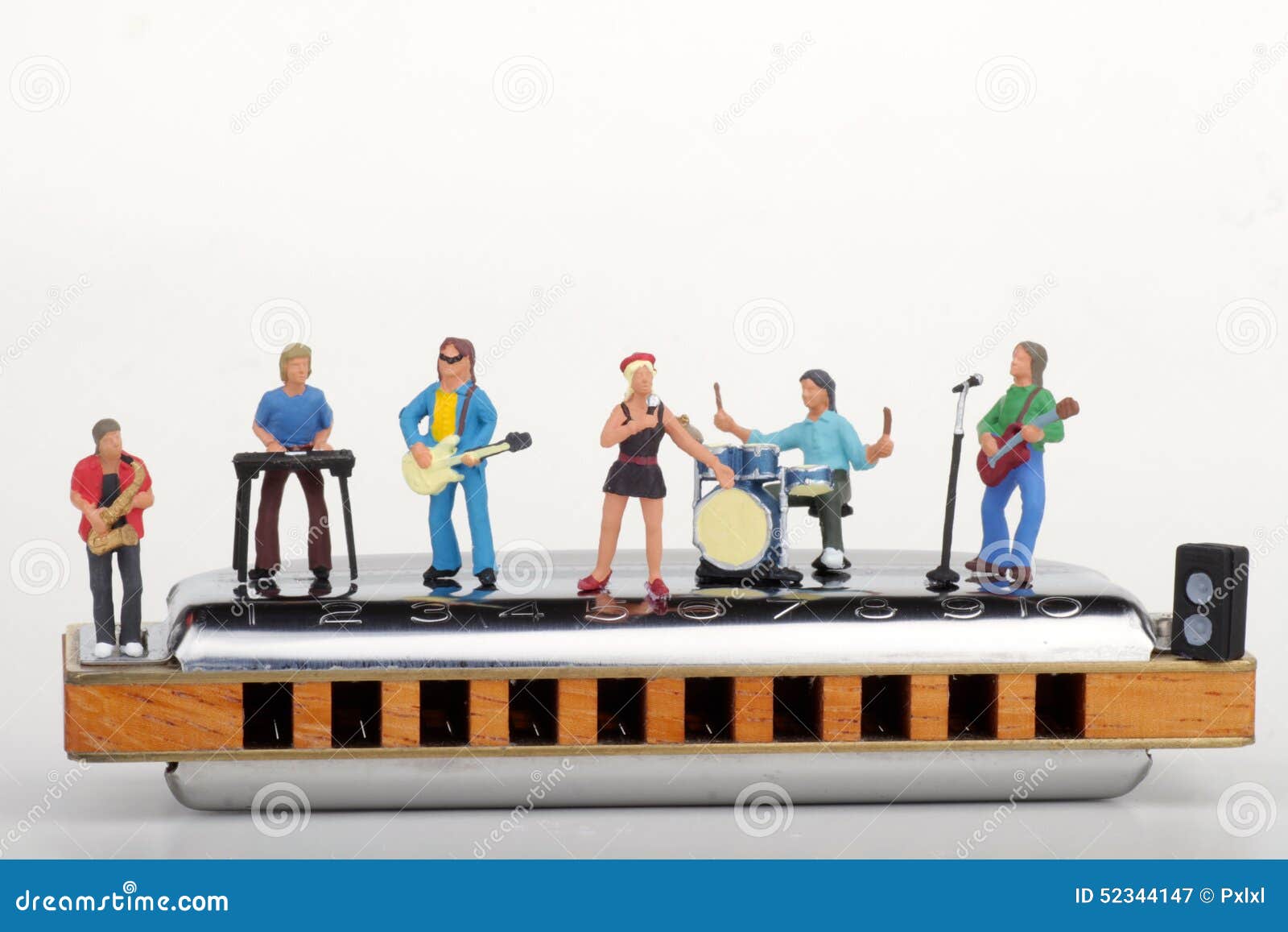 Miniature of a Rock Band Playing on the Harmonica Stock Image Image