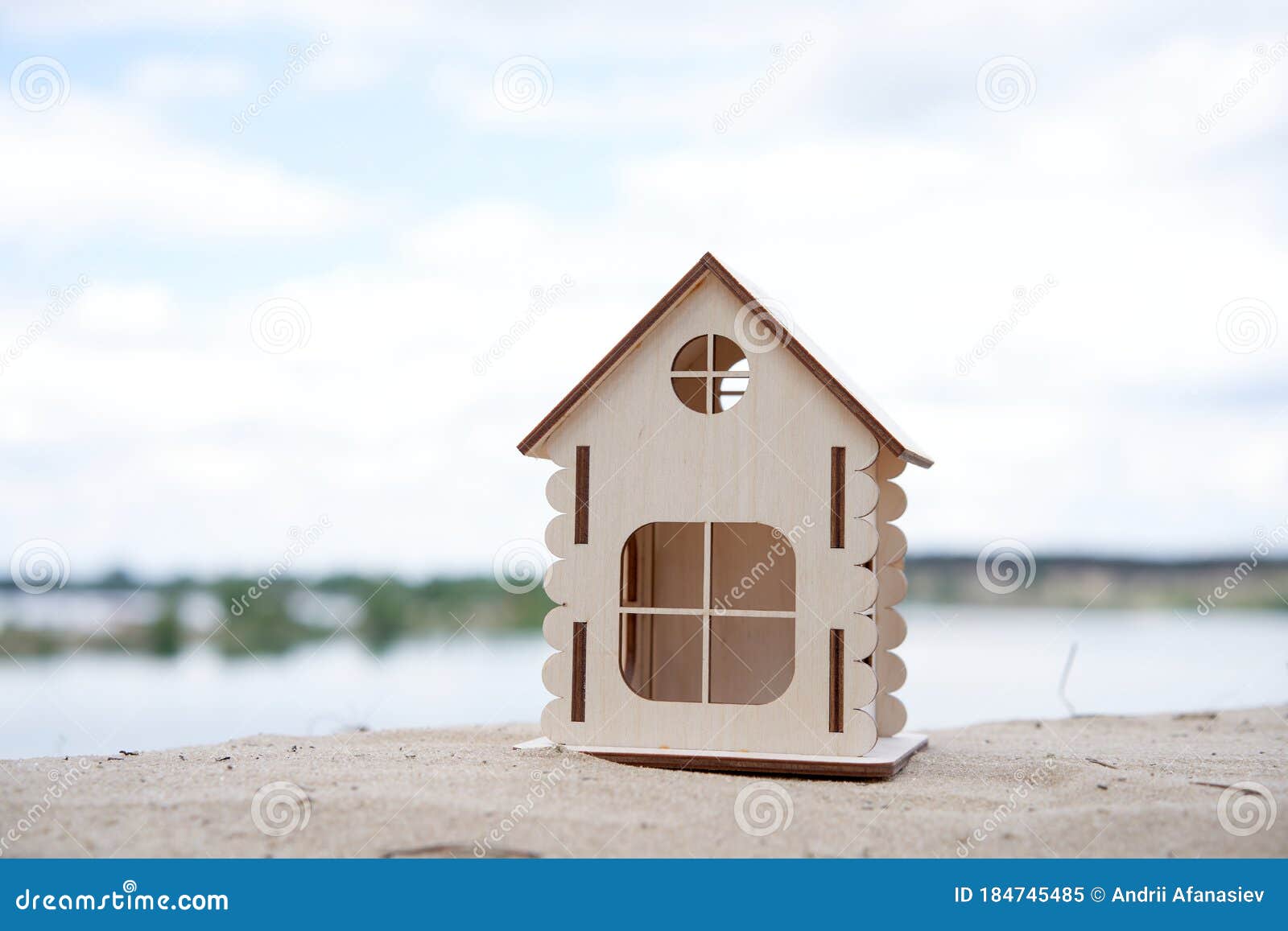 miniature wooden house outdoor nature. real estate concept. modern housing. eco-friendly energy efficient house. buying home