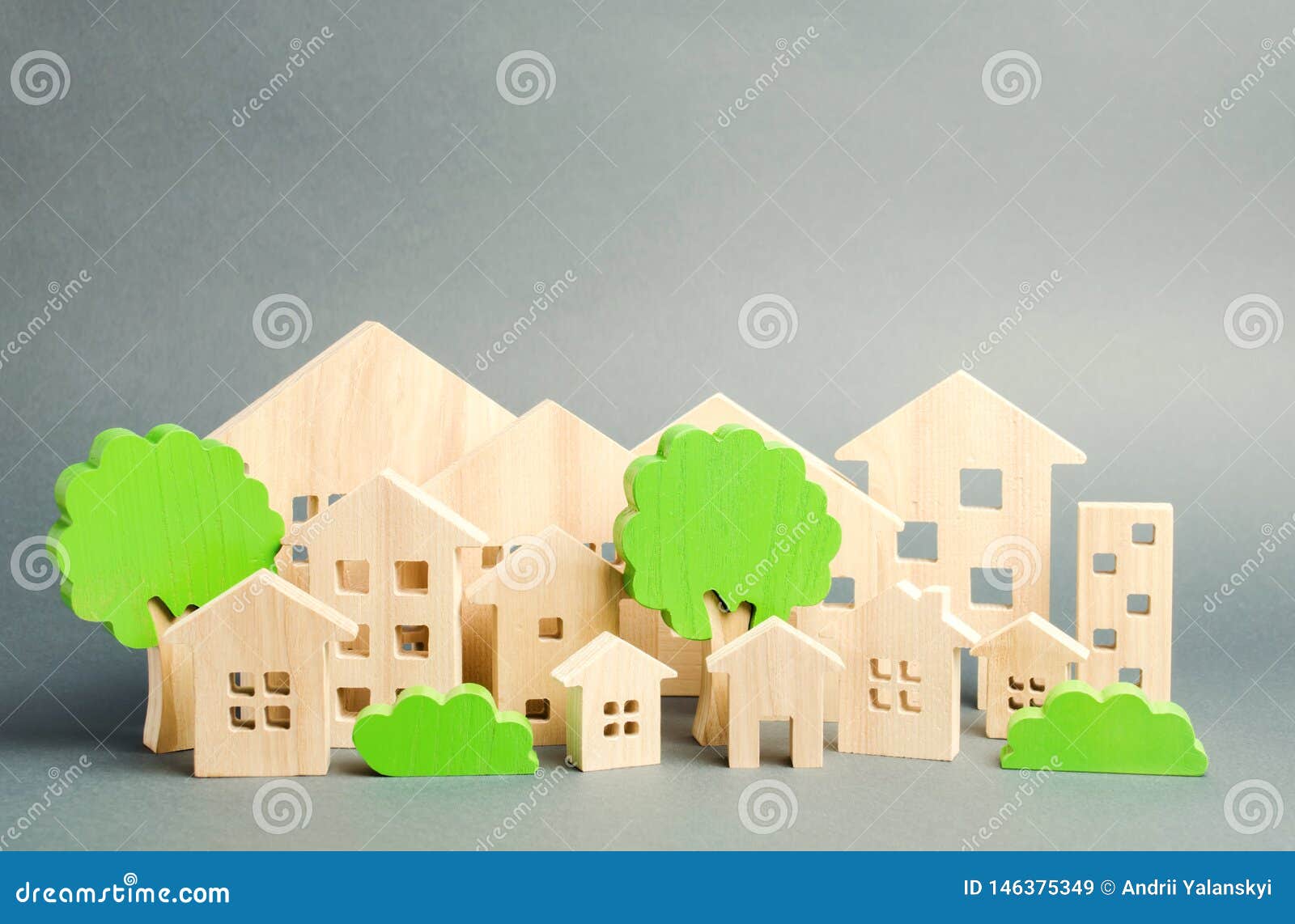 miniature wooden toy houses and trees. real estate concept. architecture in the city. infrastructure. affordable housing.