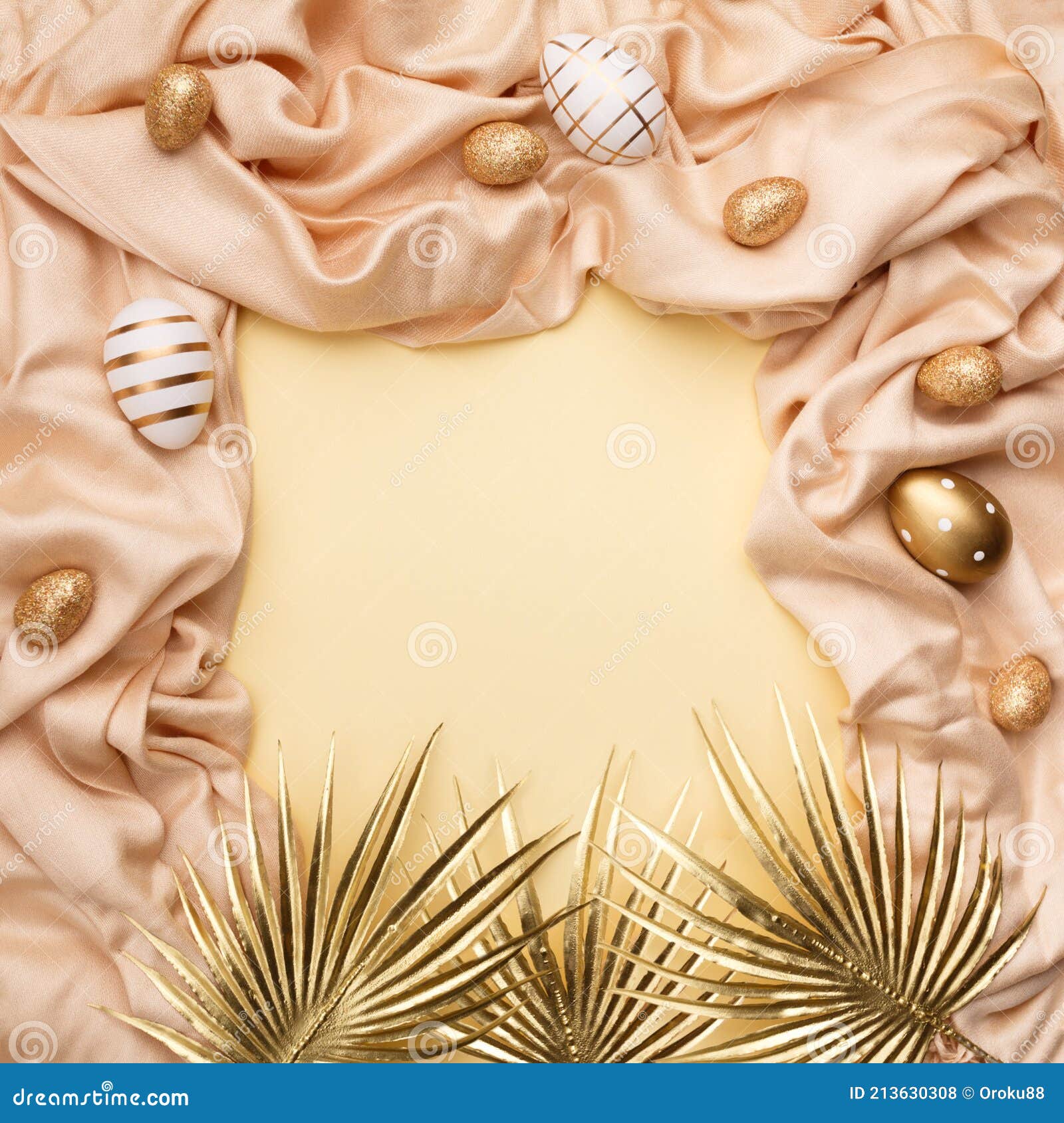 minimal concept palm leaves with a golden easter eggs on a silk or saten fabric against pastel background with copy space