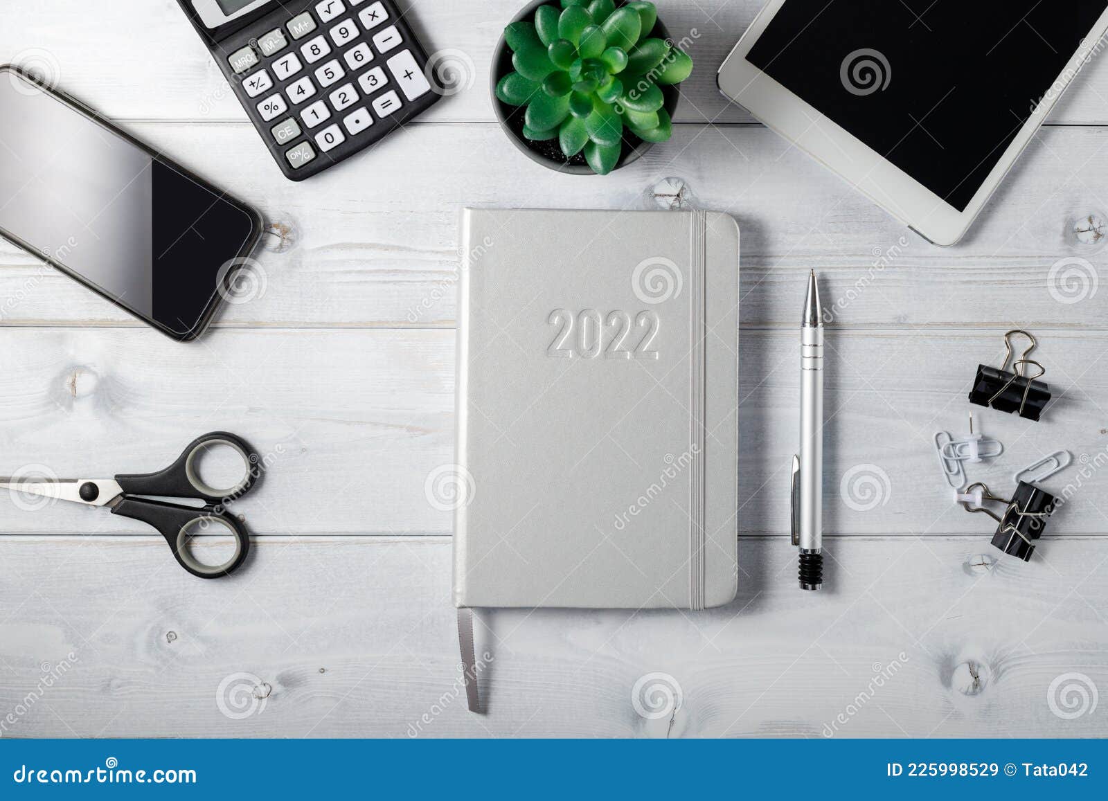 Minimal Unisex Workplace With Tablet Silver Notepad Diary 22 Smartphone Small Succulent And Stationery On A Light Wooden Stock Image Image Of Desk Grey