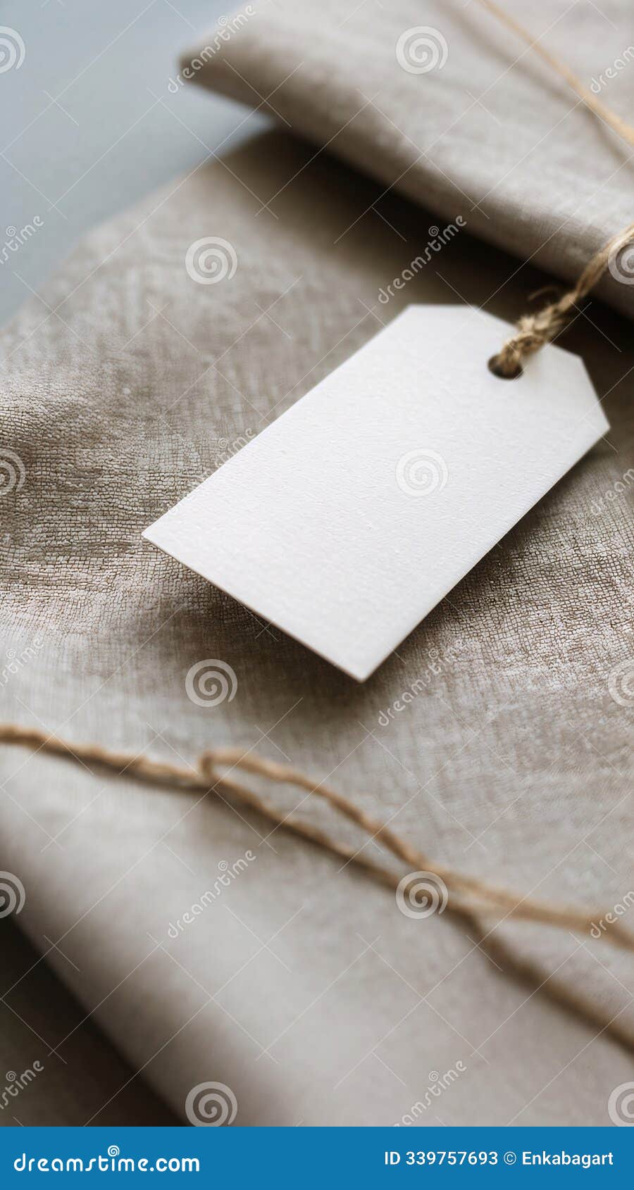 minimalist tag on textured linen fabric, mockup tag