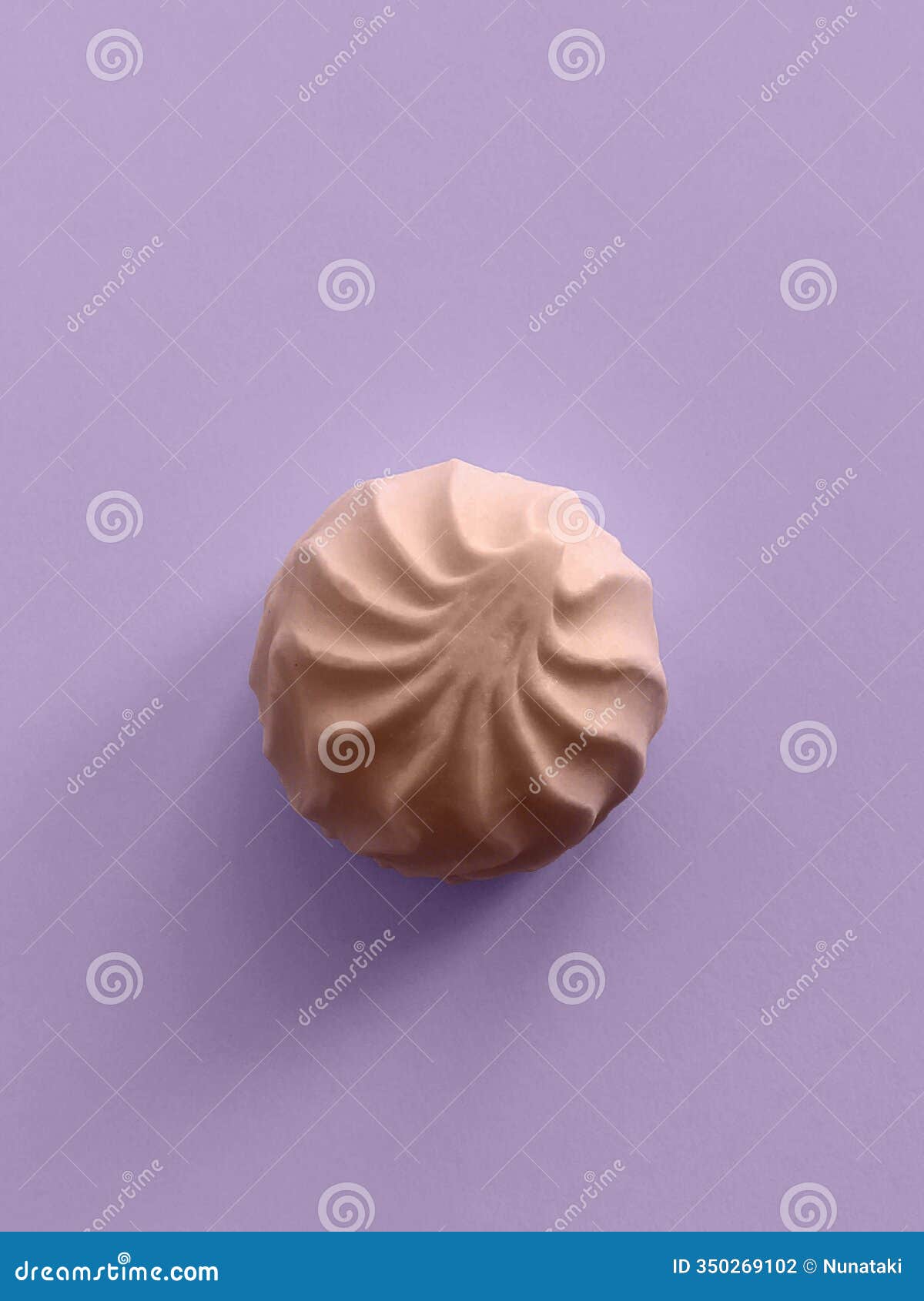 minimalist zephyr dessert with soft shadows against purple background with copy space