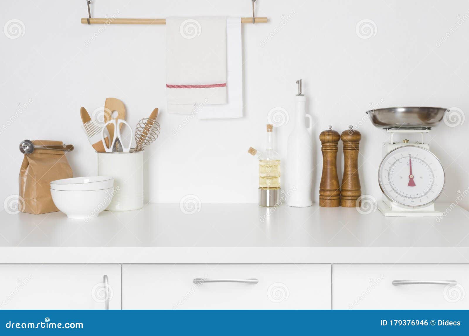 Minimalistic Modern Kitchen in Pastel Colors with Kitchenware and Space