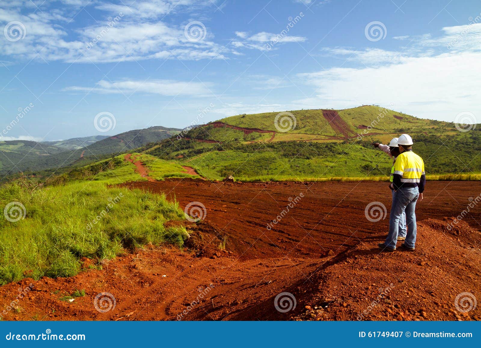 mining construction workers on mountain top in sierra leone