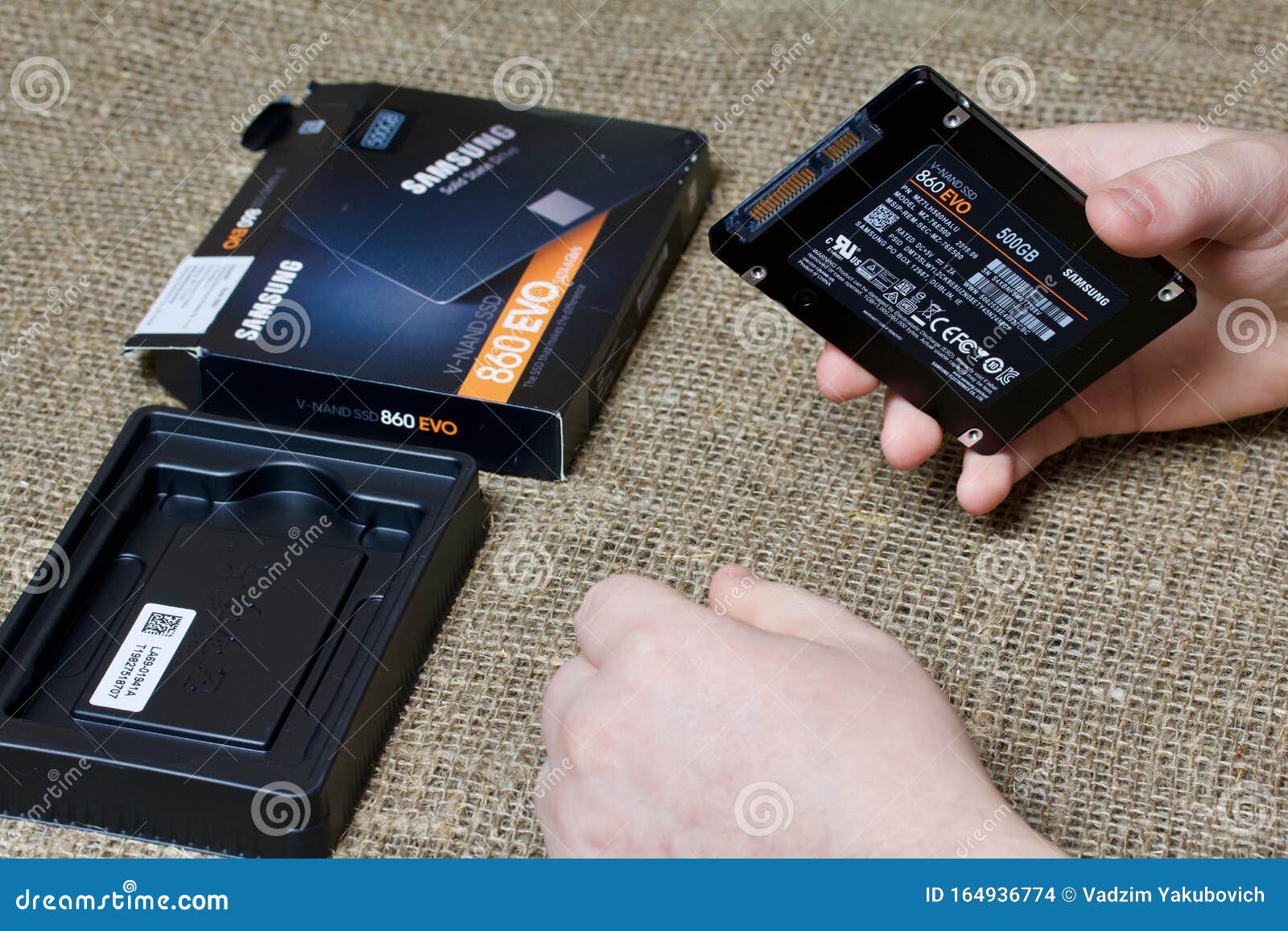 Minsk Belarus November 25 19 A Man Takes Out A Package Of Samsung 860 Evo 500gb Ssd Hard Drive Editorial Stock Image Image Of Digital Microprocessor
