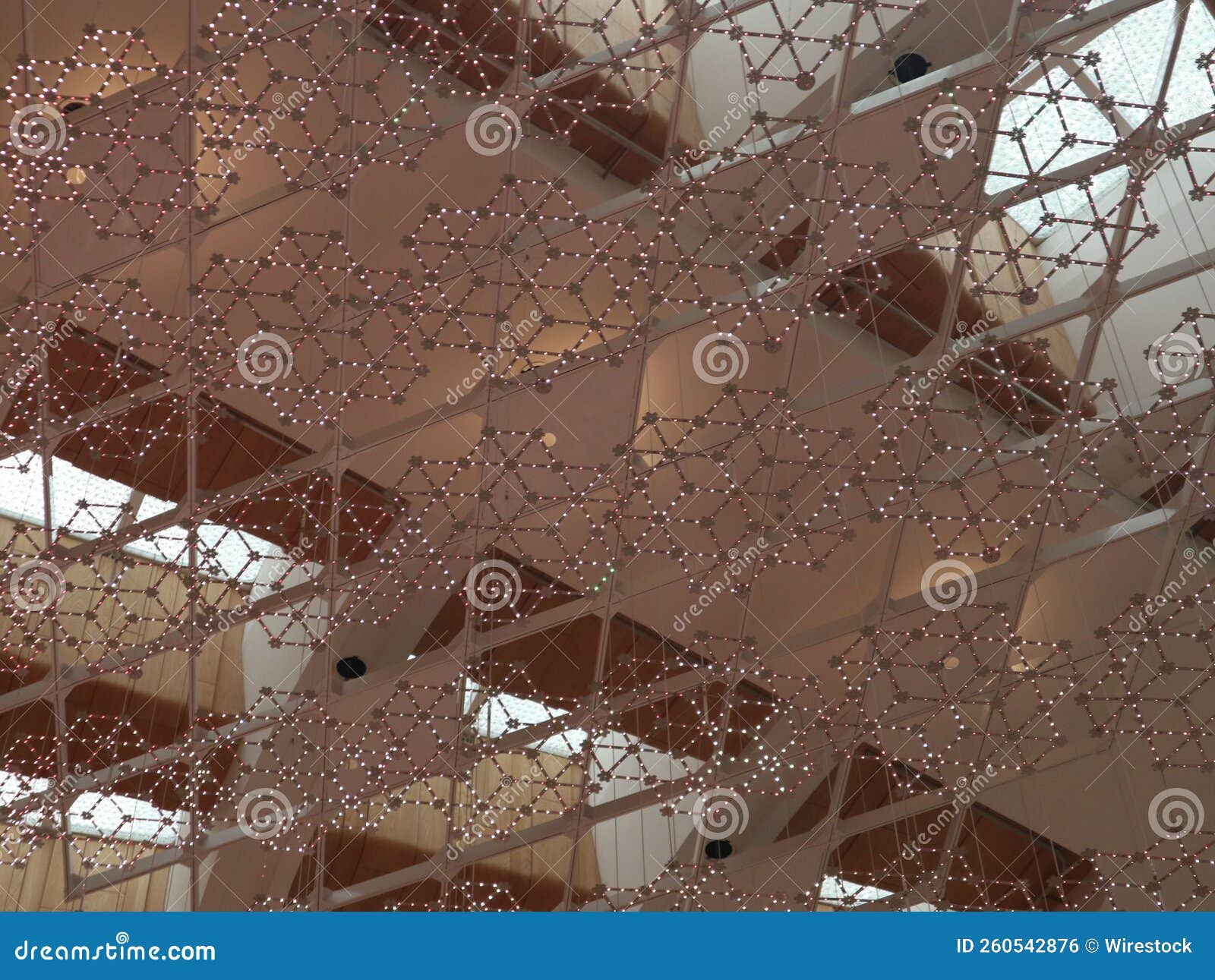 Mirrored Wall with Shiny Decorations and Walls Reflected on it Stock