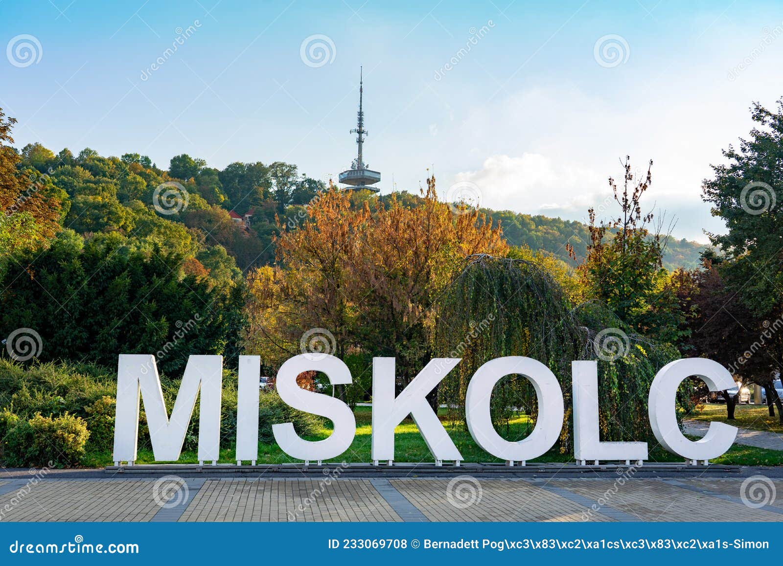 miskolc text sign in the park downtown with radio tv tower background