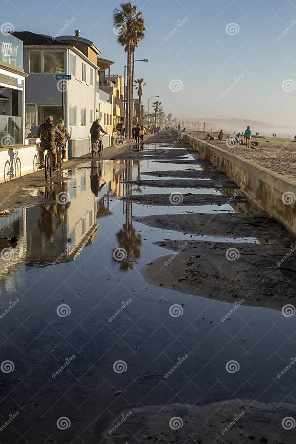 Mission Beach Broadwalk after Flooding with King Tide Waves. San Diego
