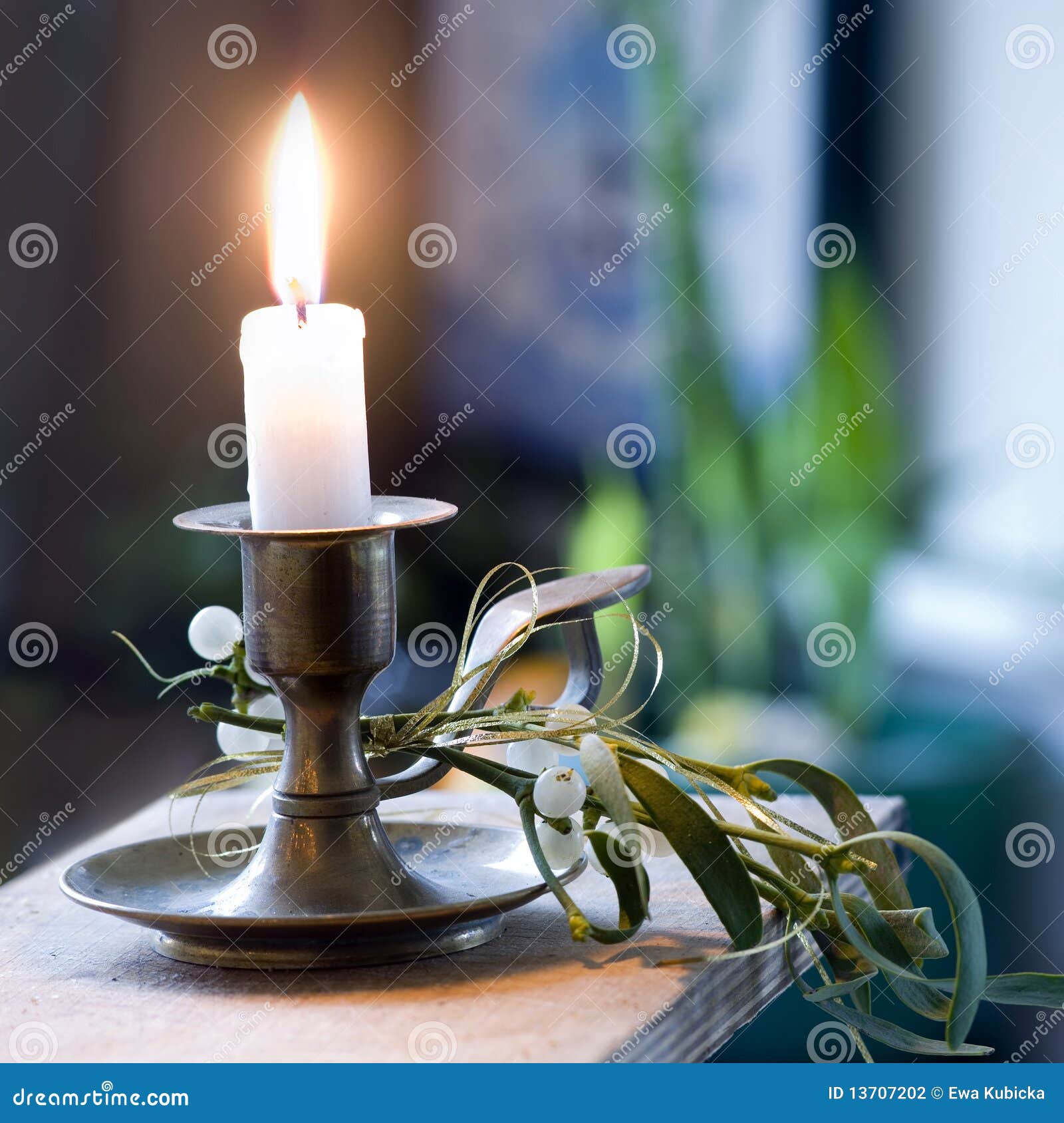 Mistletoe and candle light stock photo. Image of loss 13707202