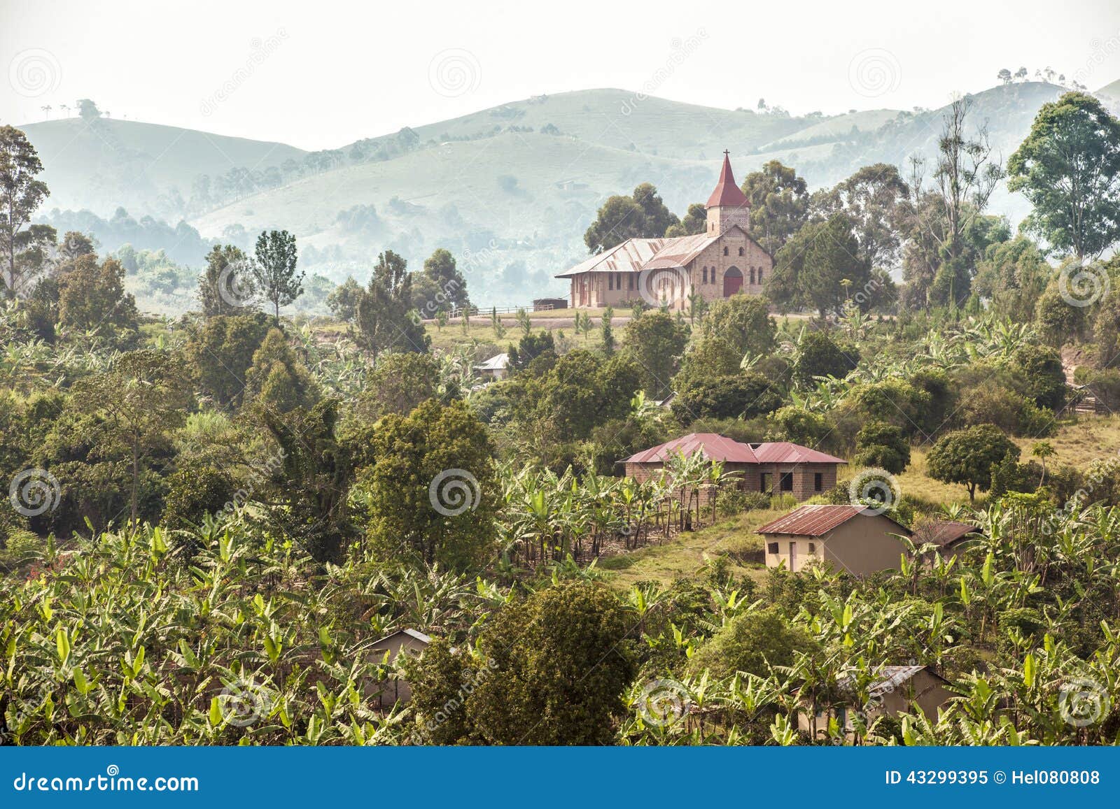 uganda - misty landscape with church