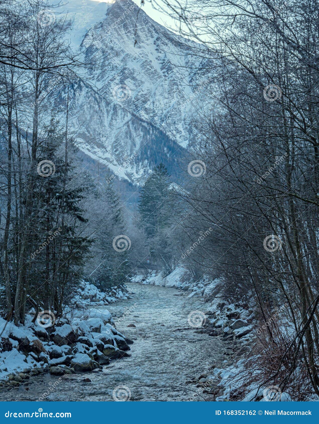 A Misty Mountain Stream Flows through a Snowy Landscape. Stock Photo -  Image of environment, capped: 168352162