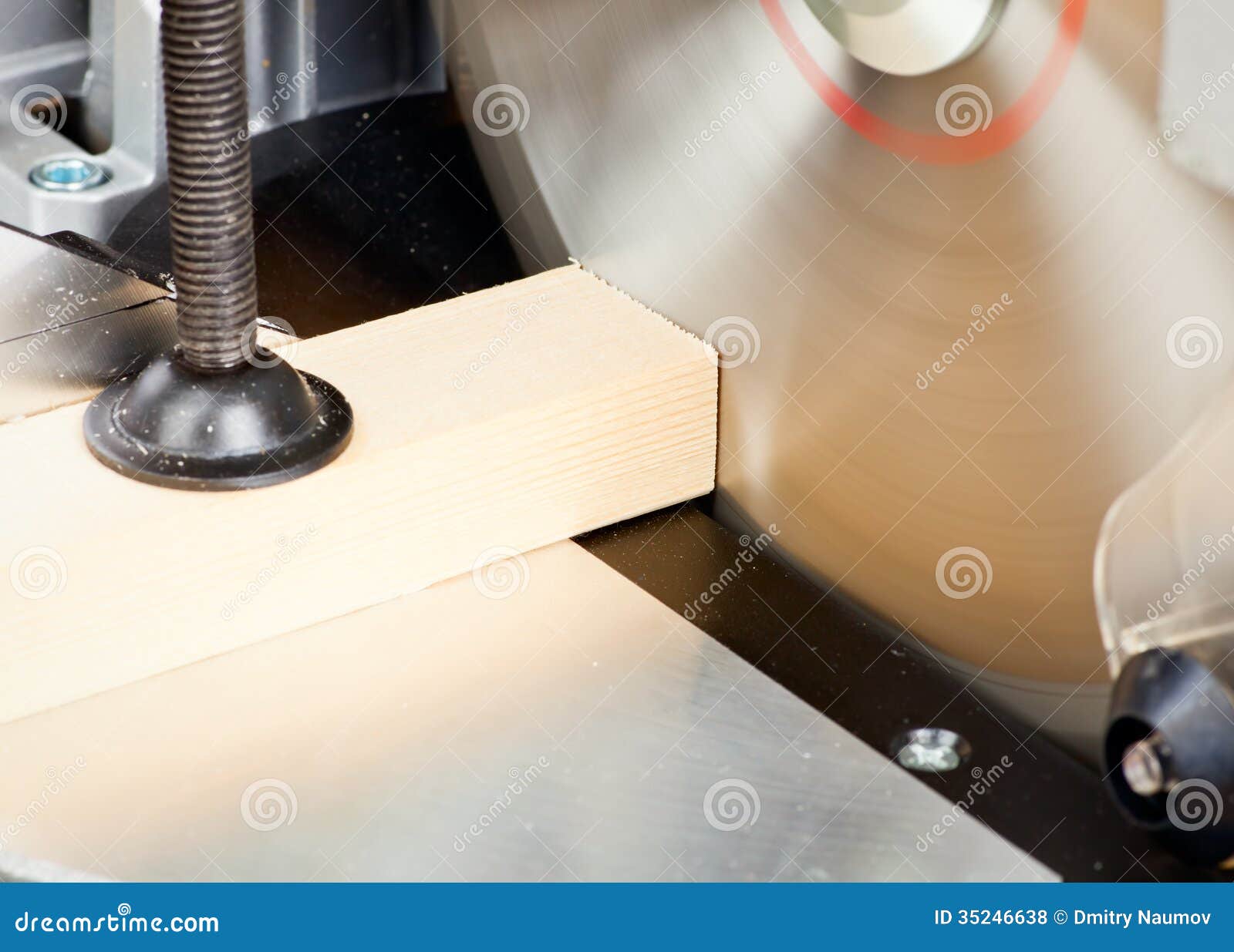 Miter saw cutting wood stock photo. Image of circular 35246638