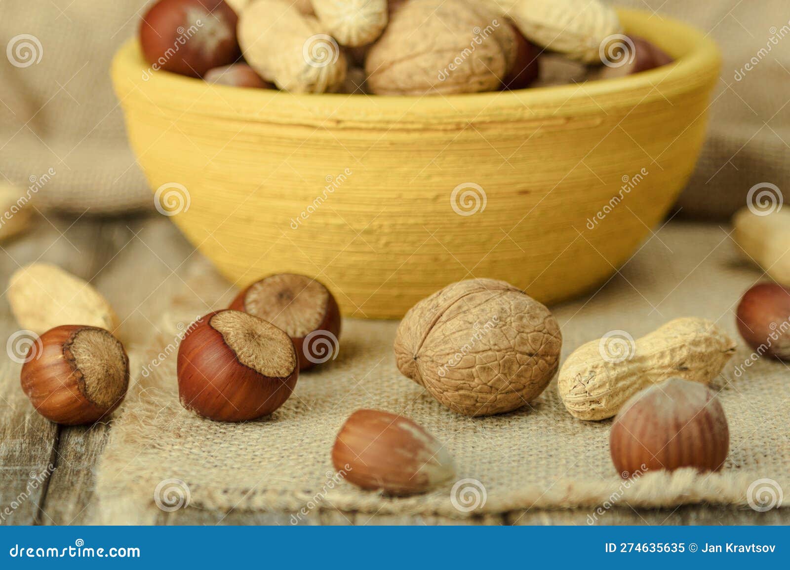 A Mix of Nuts in a Shell, in a Clay Plate Stock Image Image of
