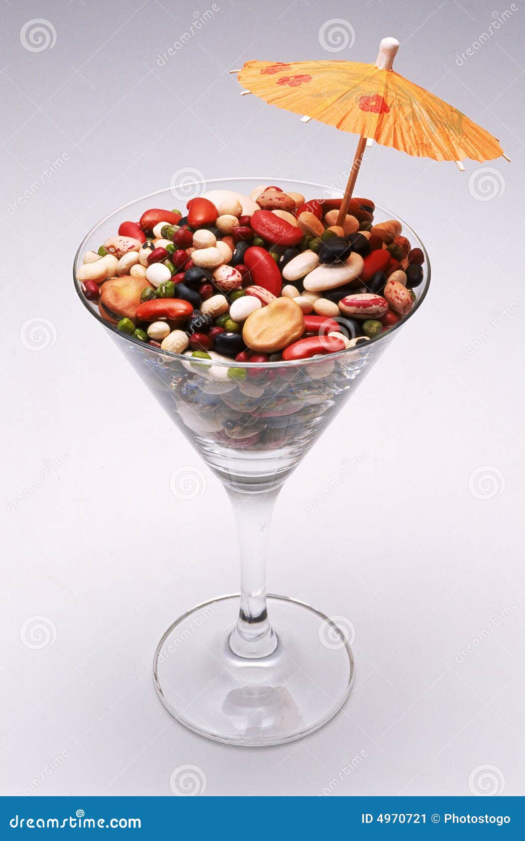 Mixed Beans In Cocktail Glass With Umbrella Picture. Image 4970721
