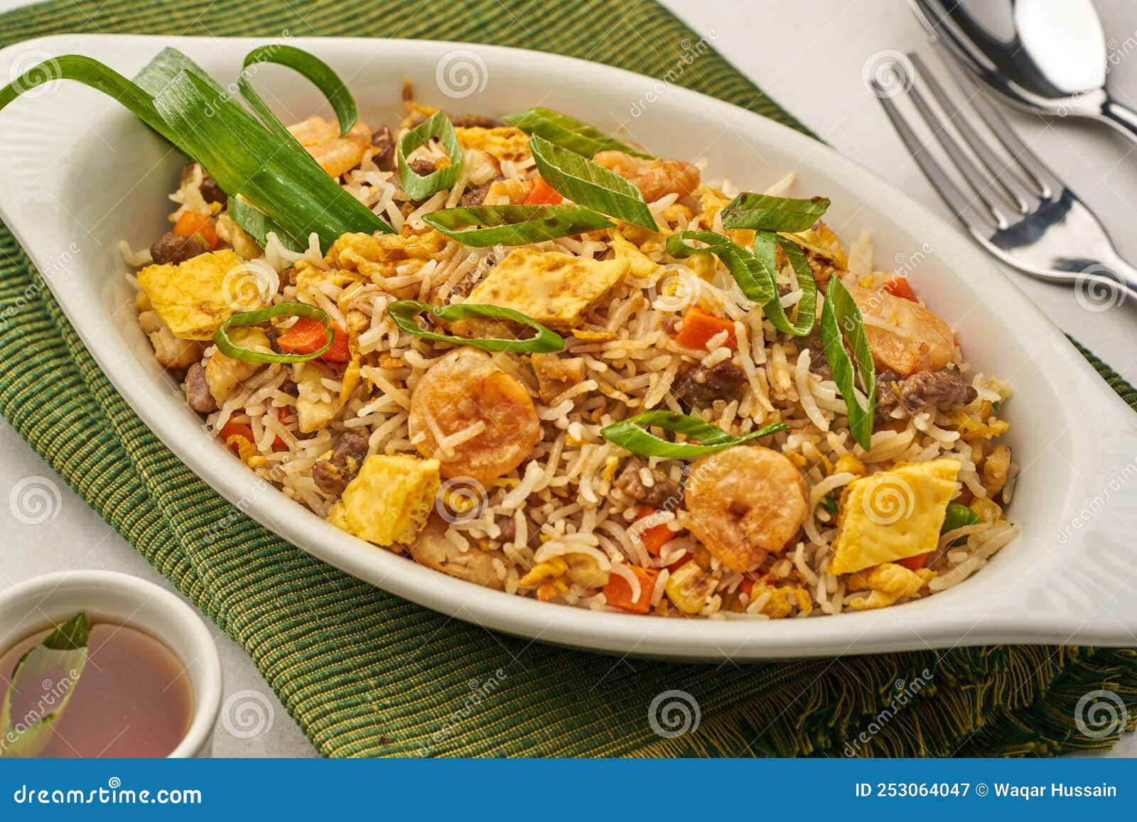 Mixed Fried Rice Served in a Dish Isolated on Grey Background Side View