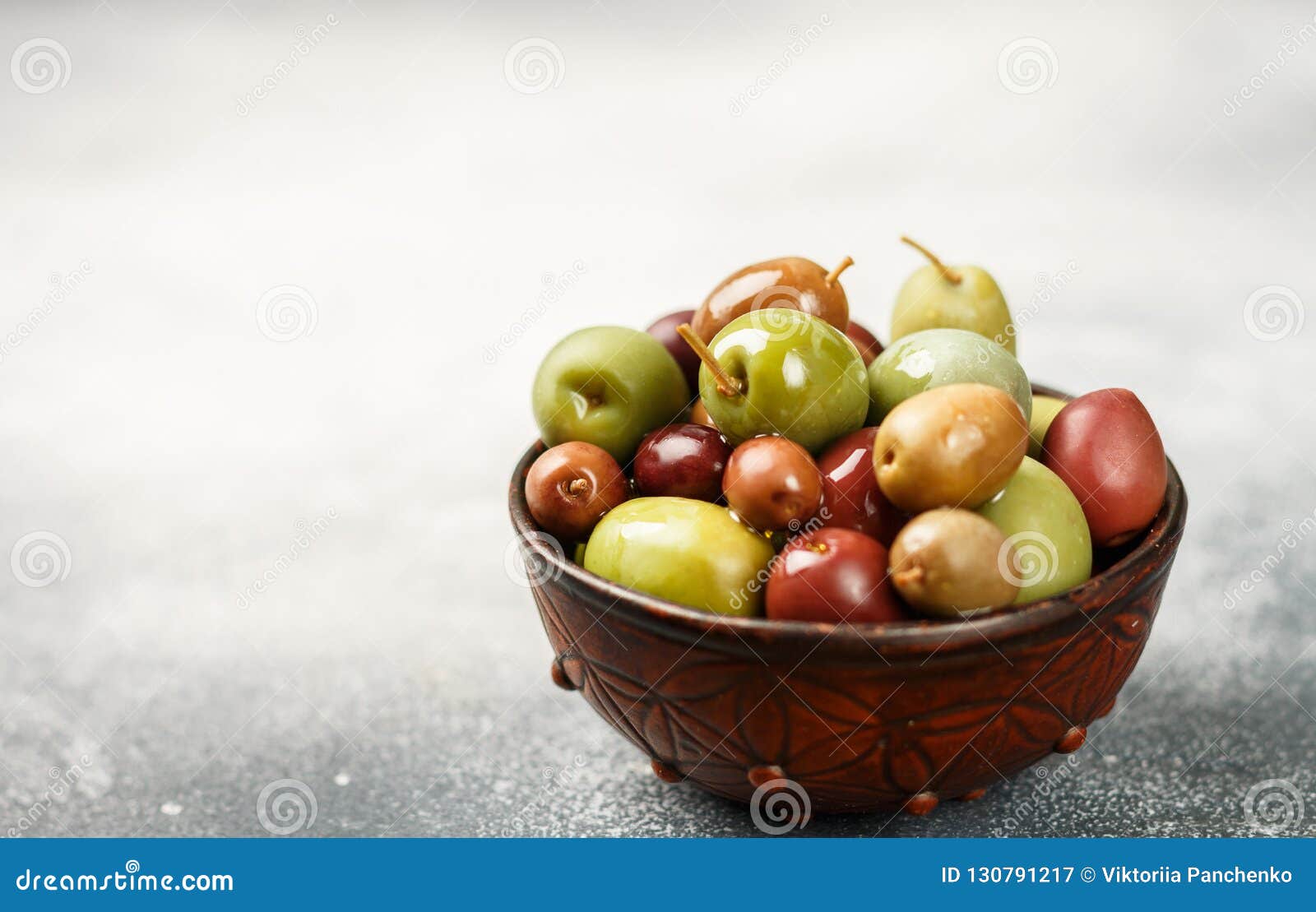 Mixed Marinated Olives Green, Black and Purple in Ceramic Bowl and