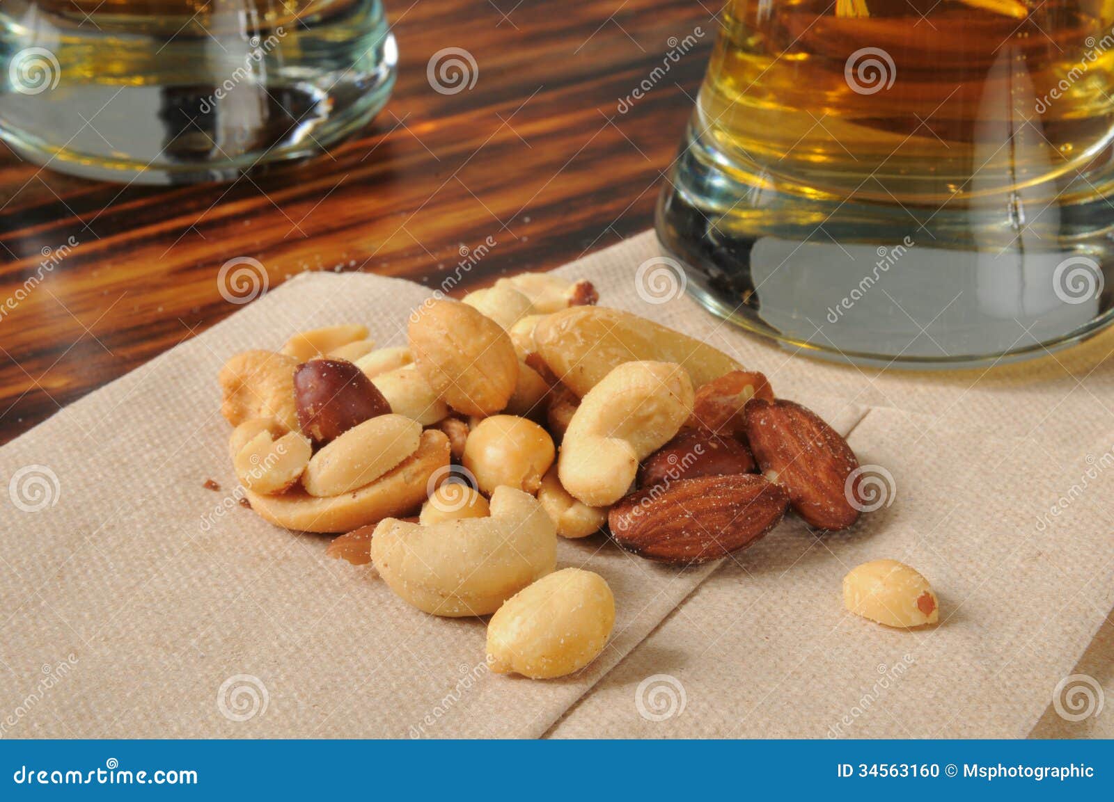Mixed nuts with beer stock photo. Image of beverage, drink 34563160