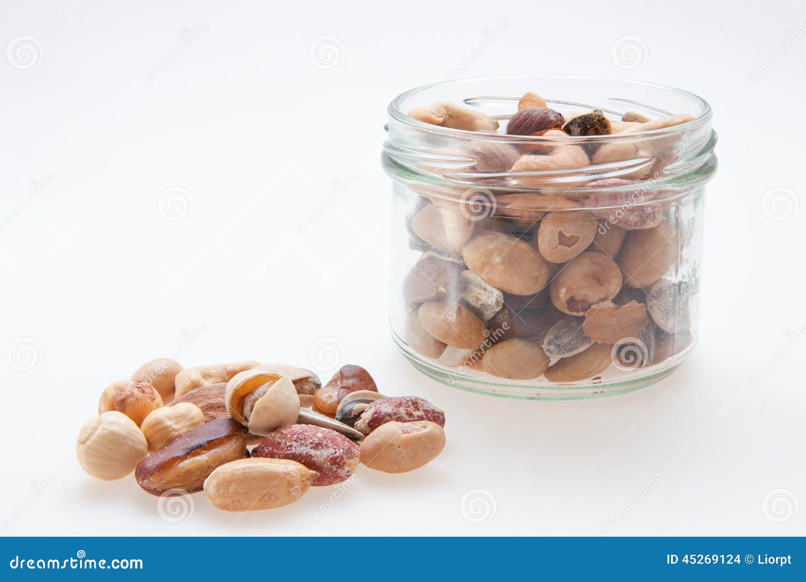 Mixed nuts with jar stock photo. Image of eating, isolated 45269124