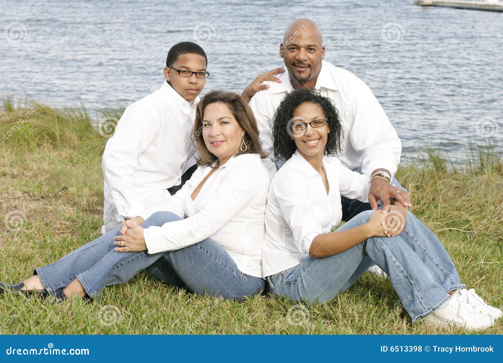 Mixed race family stock photo. Image of adolescence, group 6513398