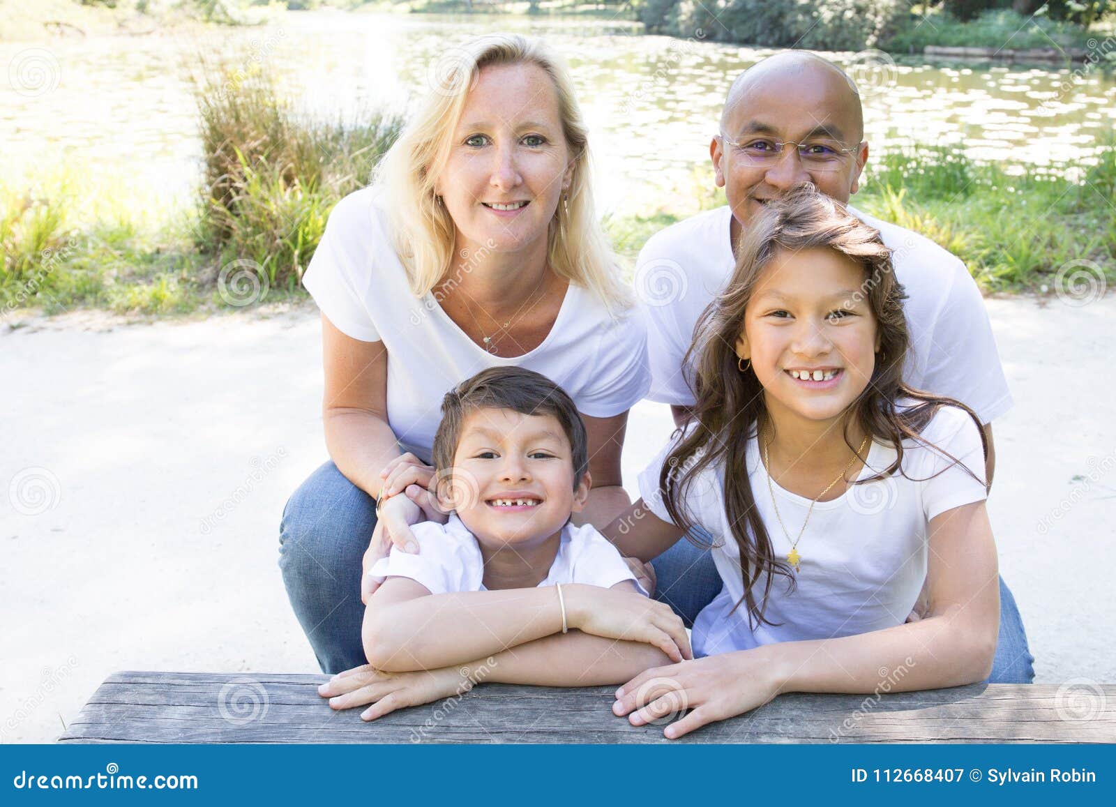 Mixed Race Parents with Their Children in the Countryside Ftrom South American and Blond Caucasian Stock Image - Image of mexican, race: