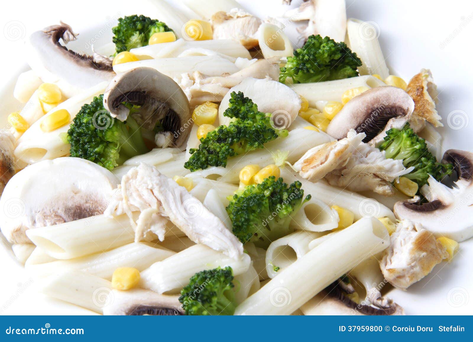 Mixed Salad with Eggs, Pasta, Mushrooms and Chicken Meat Stock Photo