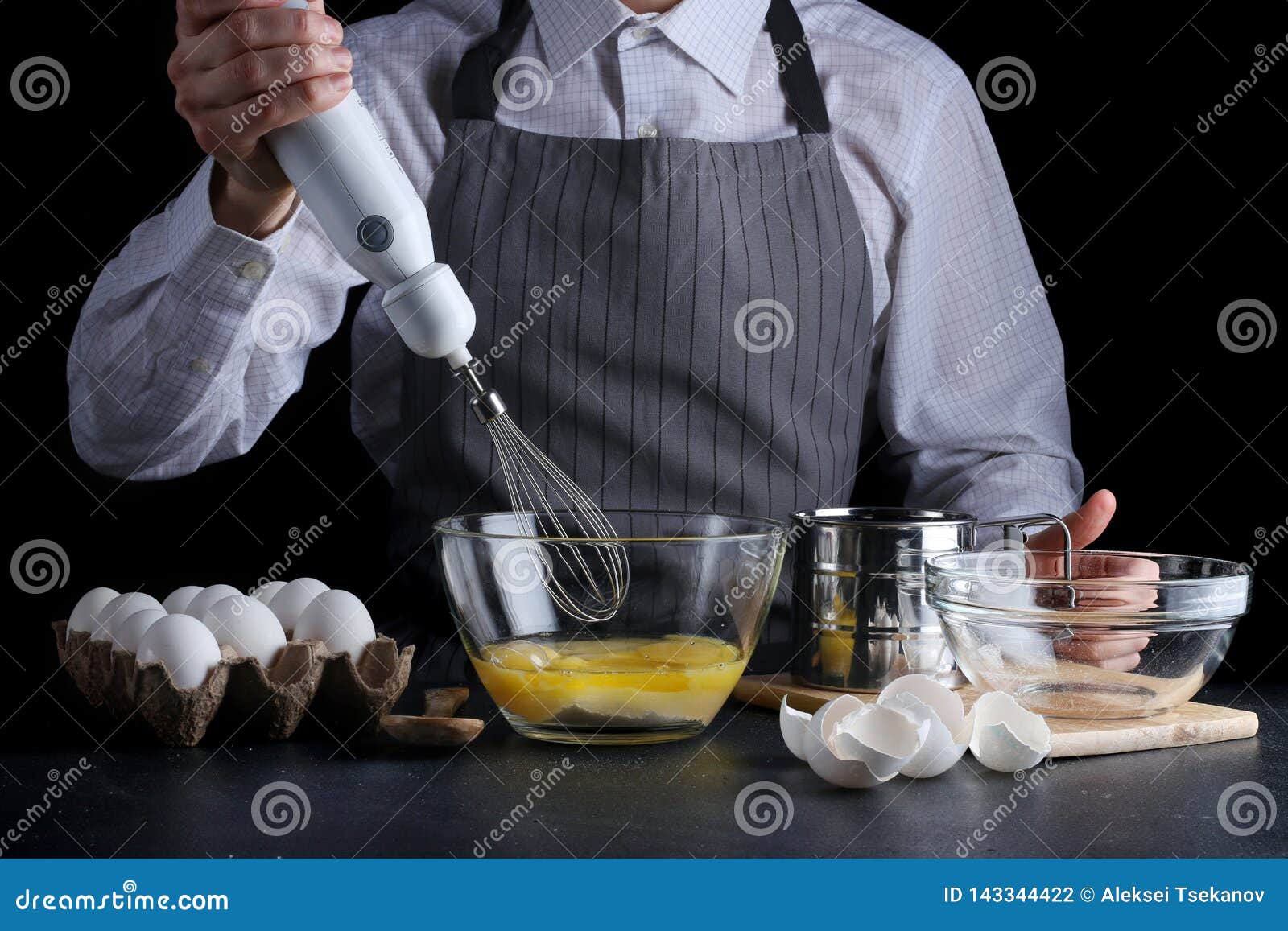 Mixer and Dough. Recipe of Pie or Cake Concept on Dark Stock Photo