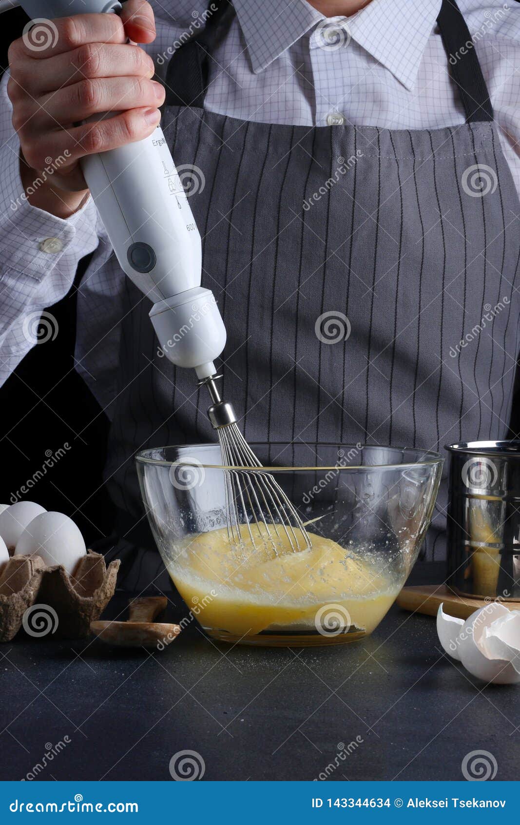 Mixer and Dough. Recipe of Pie or Cake Concept on Dark Stock Photo
